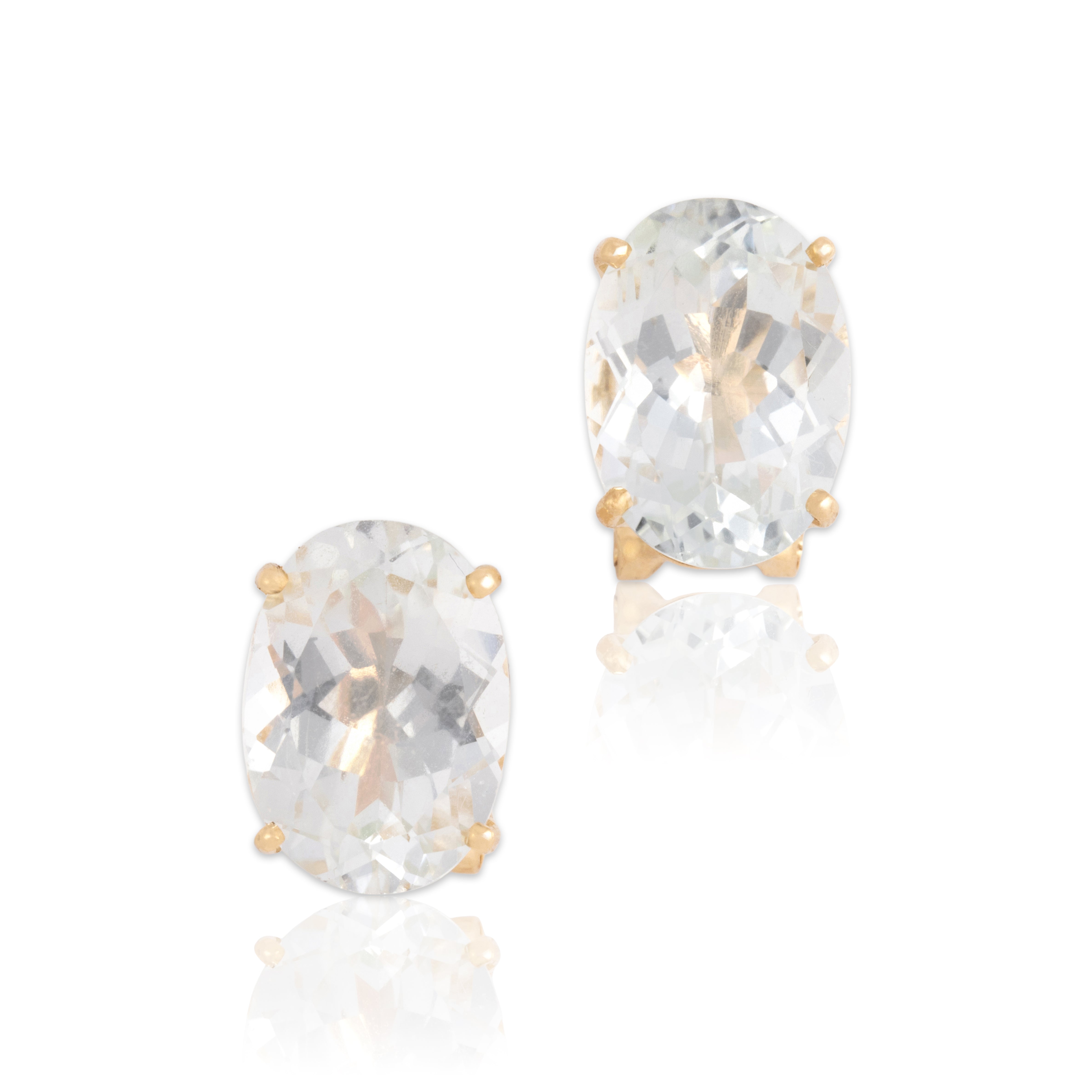 Vintage 14k Yellow Gold 13.65cttw Pale Blue Topaz Flashing Icy Oval Omega Back Earrings - Close-up view