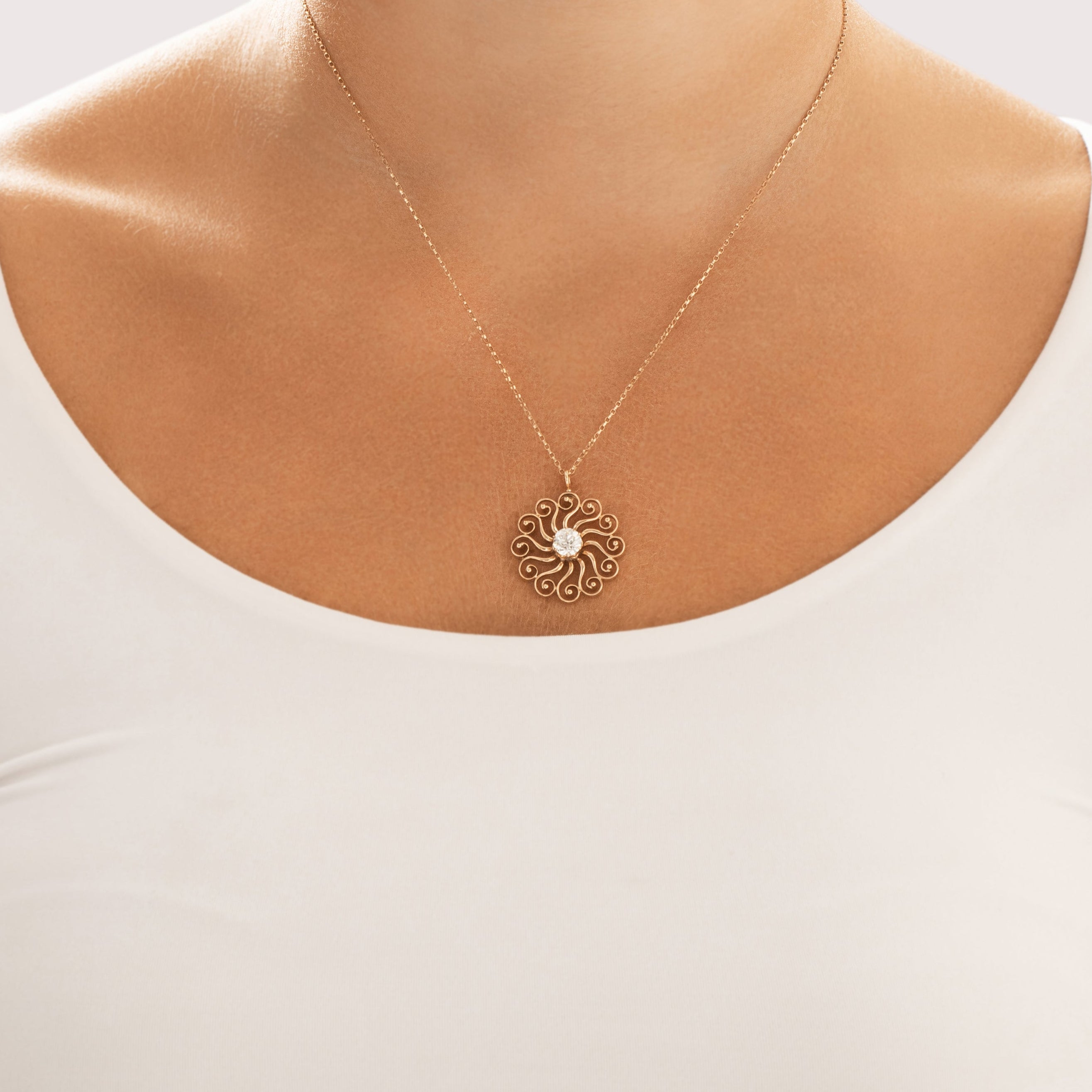 Antique 14k Yellow Gold .89ct Old European Cut Diamond Dazzling Swirling Sun Pendant - On model view