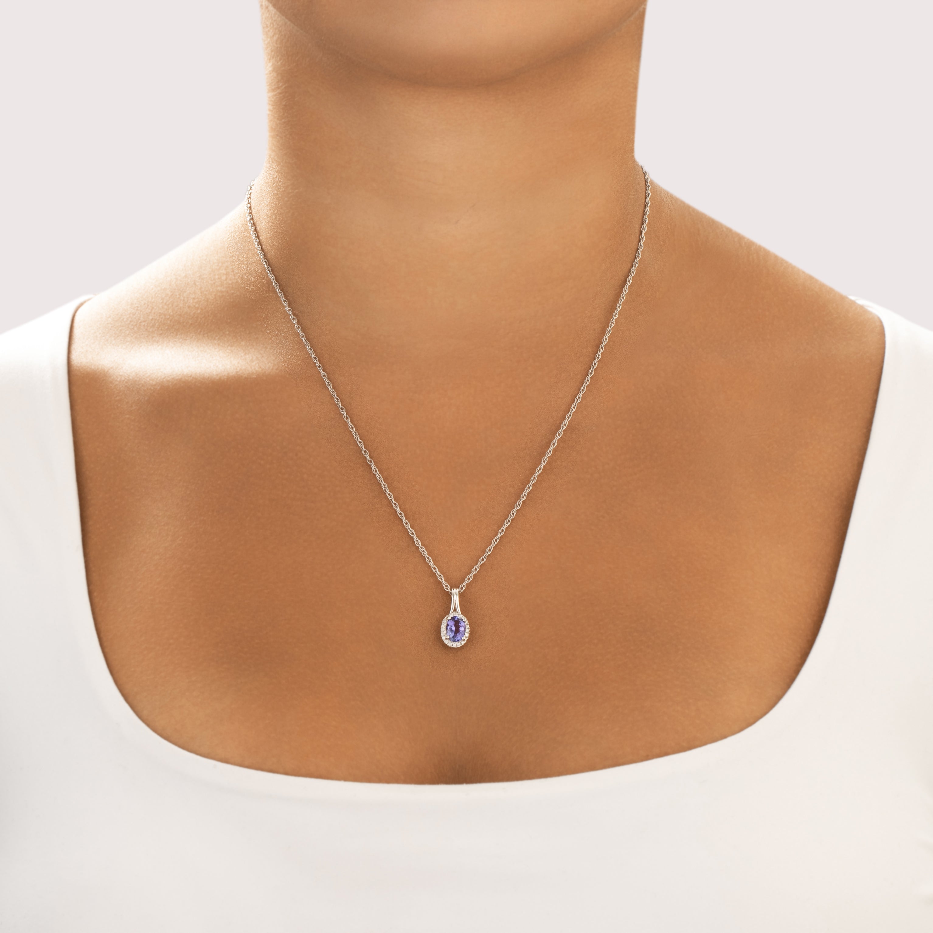 Vintage 14k White Gold 1.16ct Tanzanite Diamond Vibrant Oval Halo Pendant - On model view