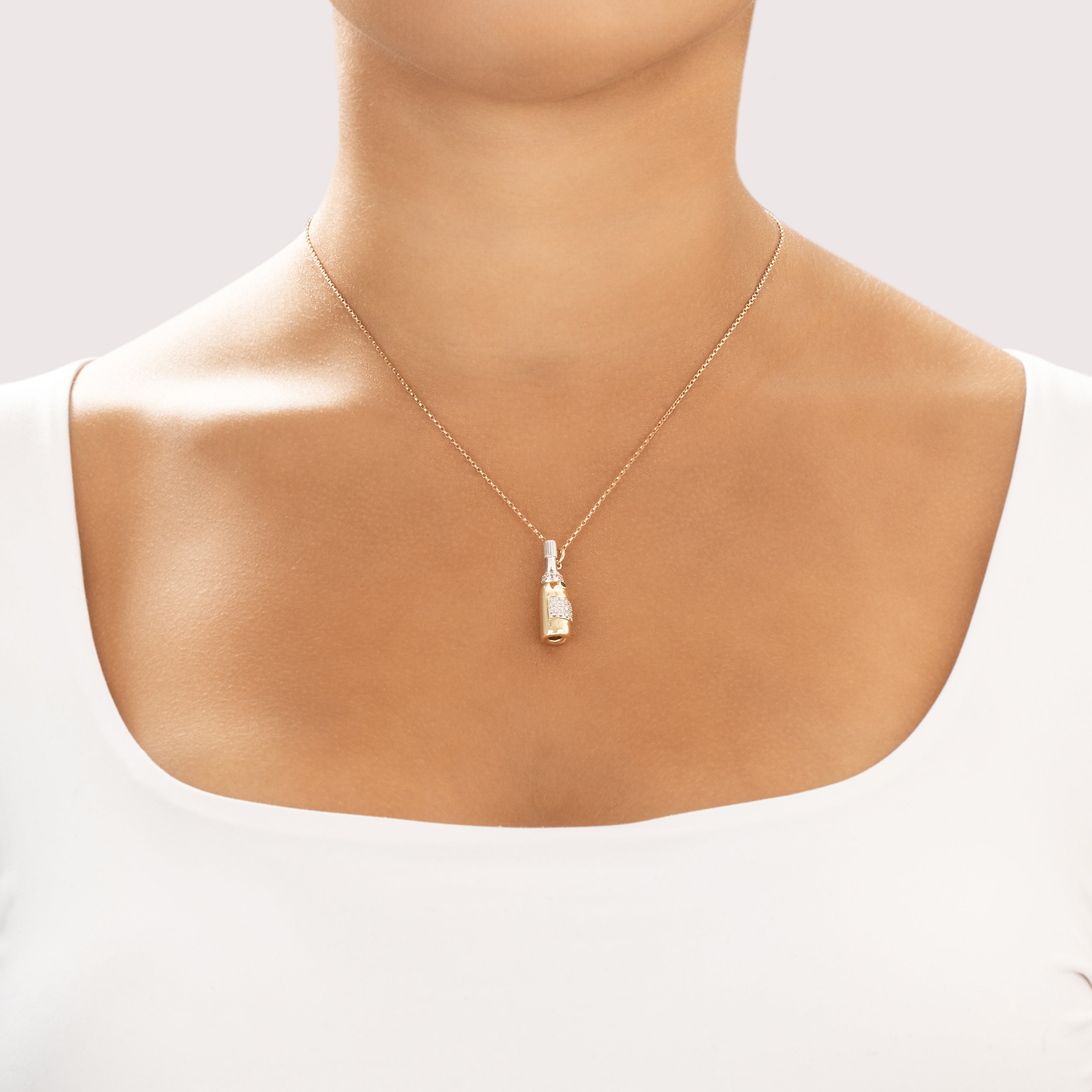 Vintage 14k Yellow & White Gold Diamond Emerald Celebratory Champagne Bottle Charm / Pendant - On model view