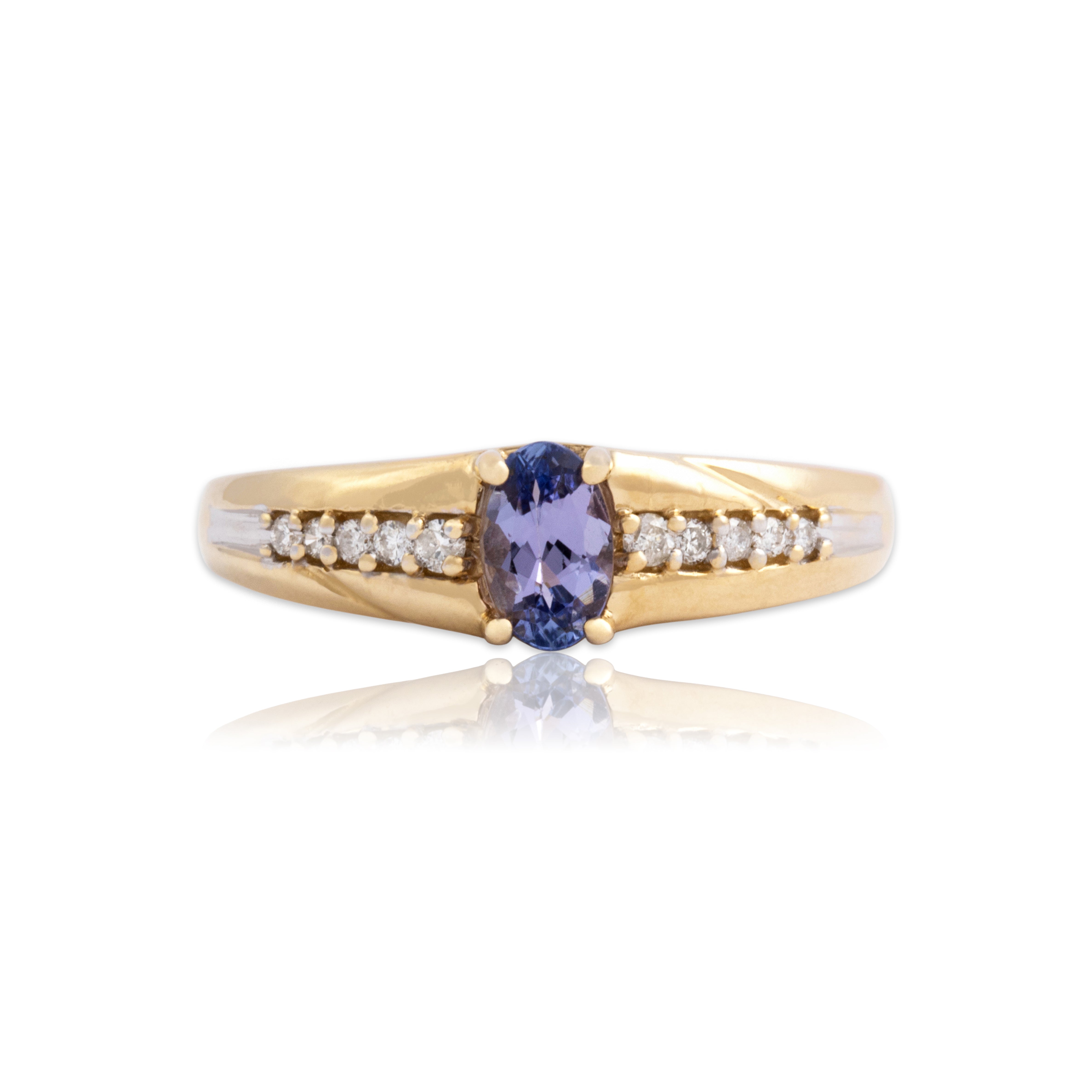 Vintage 14k Yellow Gold Tanzanite Diamond Vibrant Oval Accented Line Ring - Close-up view