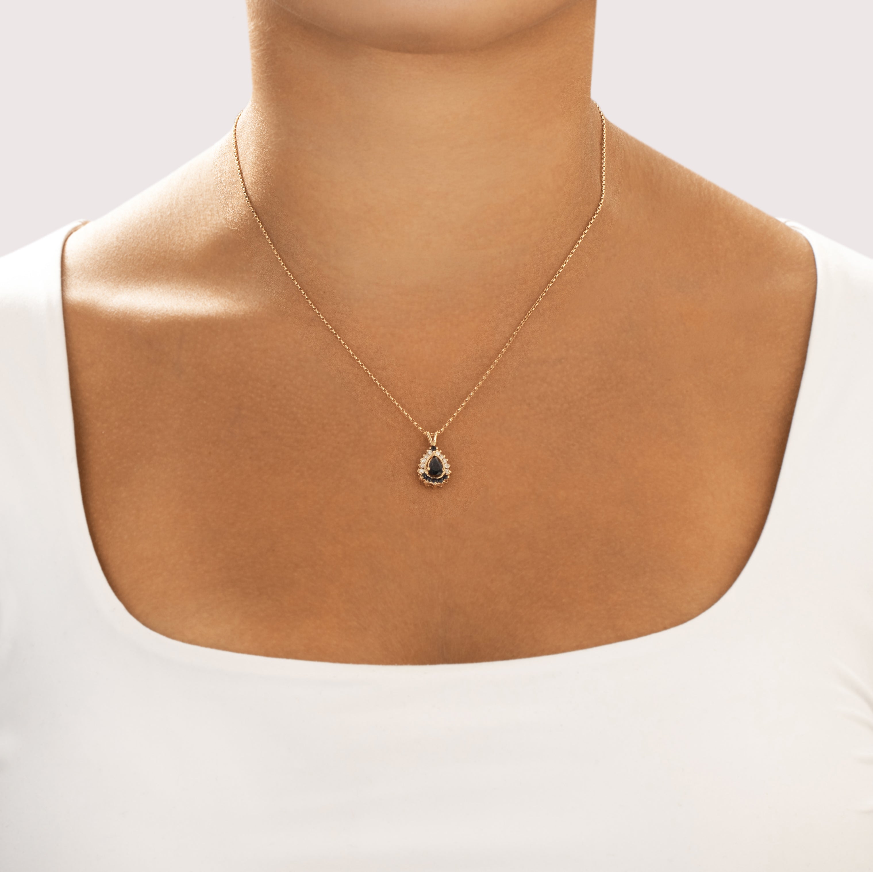Vintage 14k Yellow Gold .62cttw Blue Sapphire Diamond Alternating Celestial Pear Halo Pendant - On model view