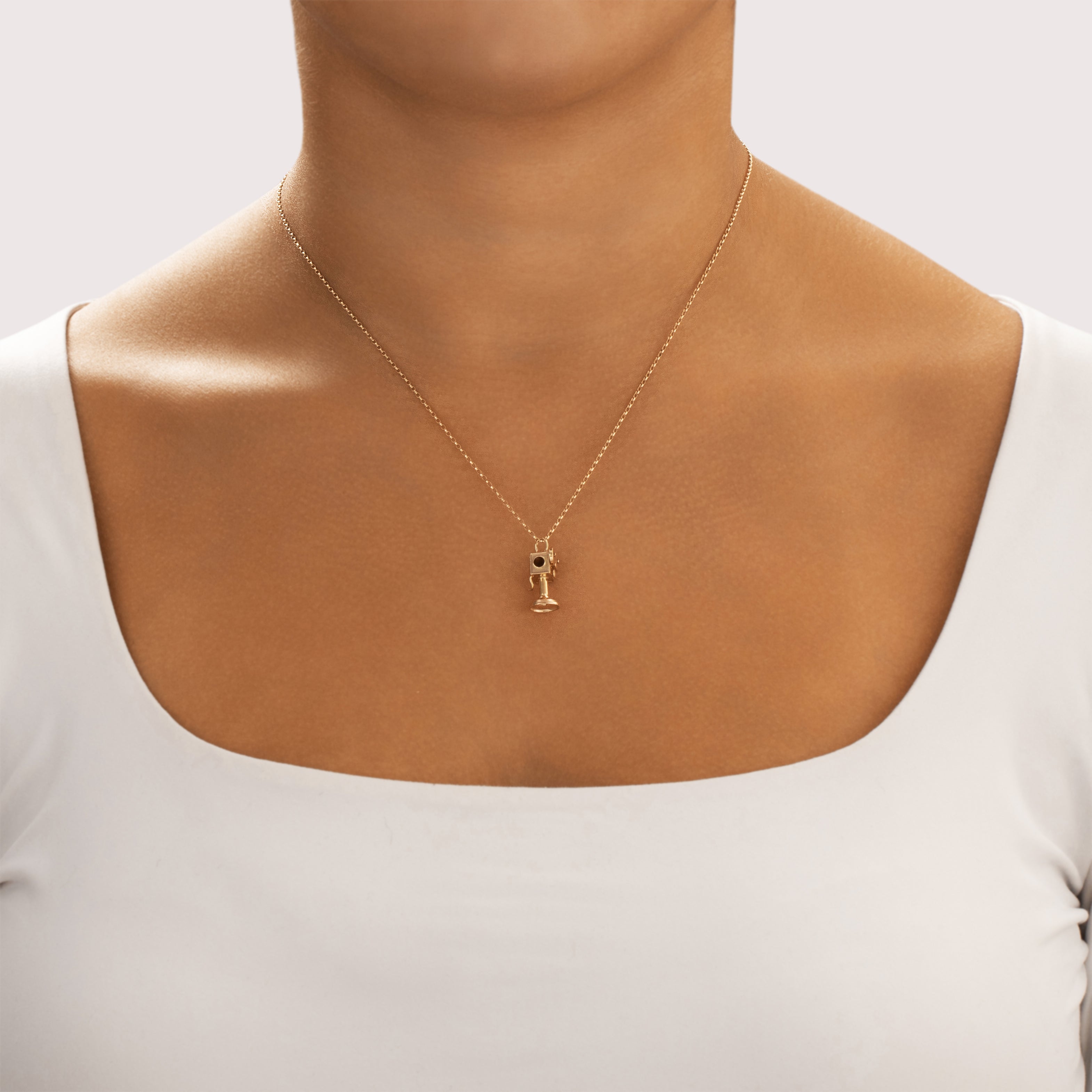 Vintage 14k Yellow Gold Articulating Cinema Film Projector Charm / Pendant - On model view