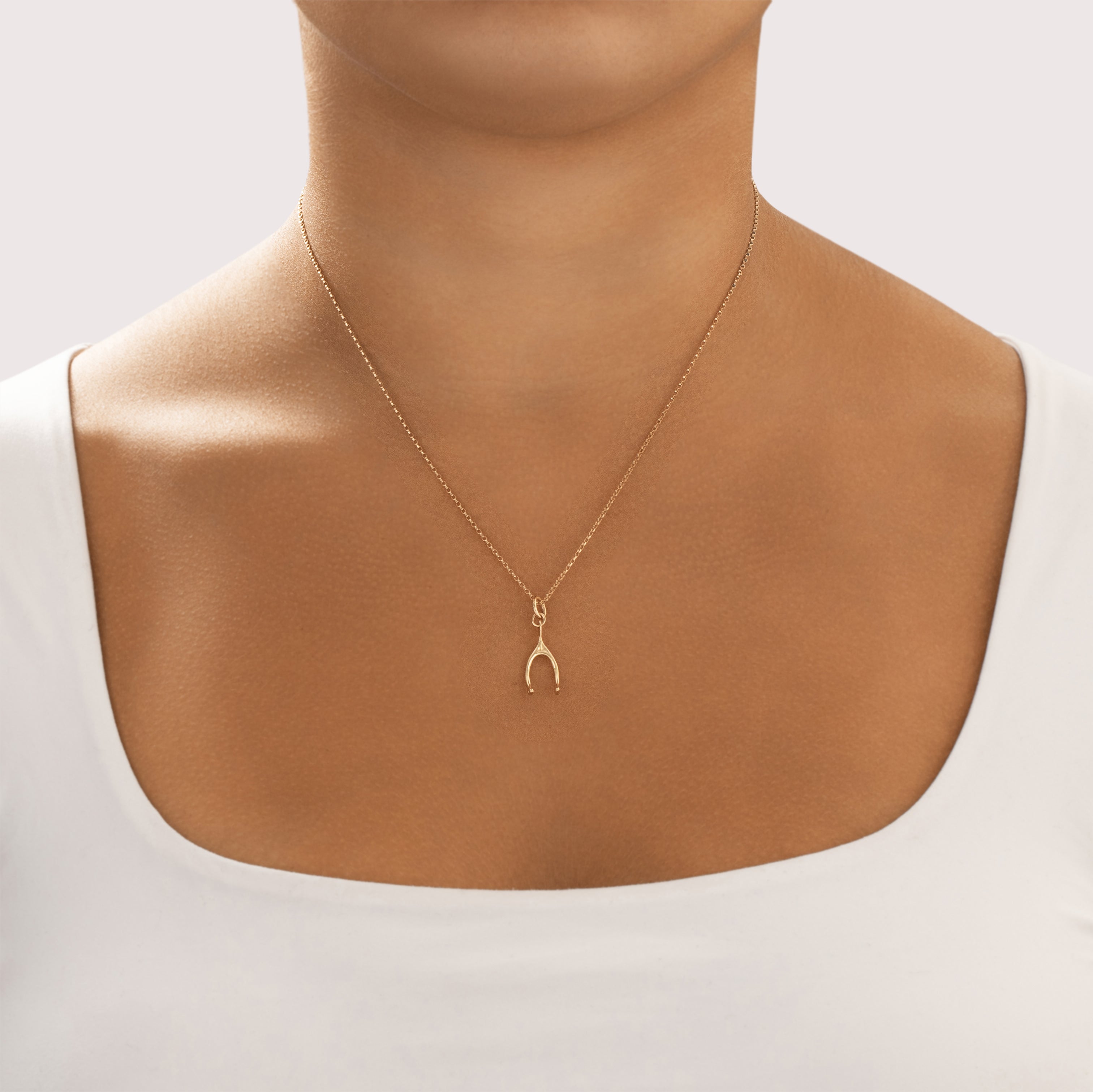 Vintage Small 14k Yellow Gold Adorable Dimensional Wishbone Charm / Pendant - On model view