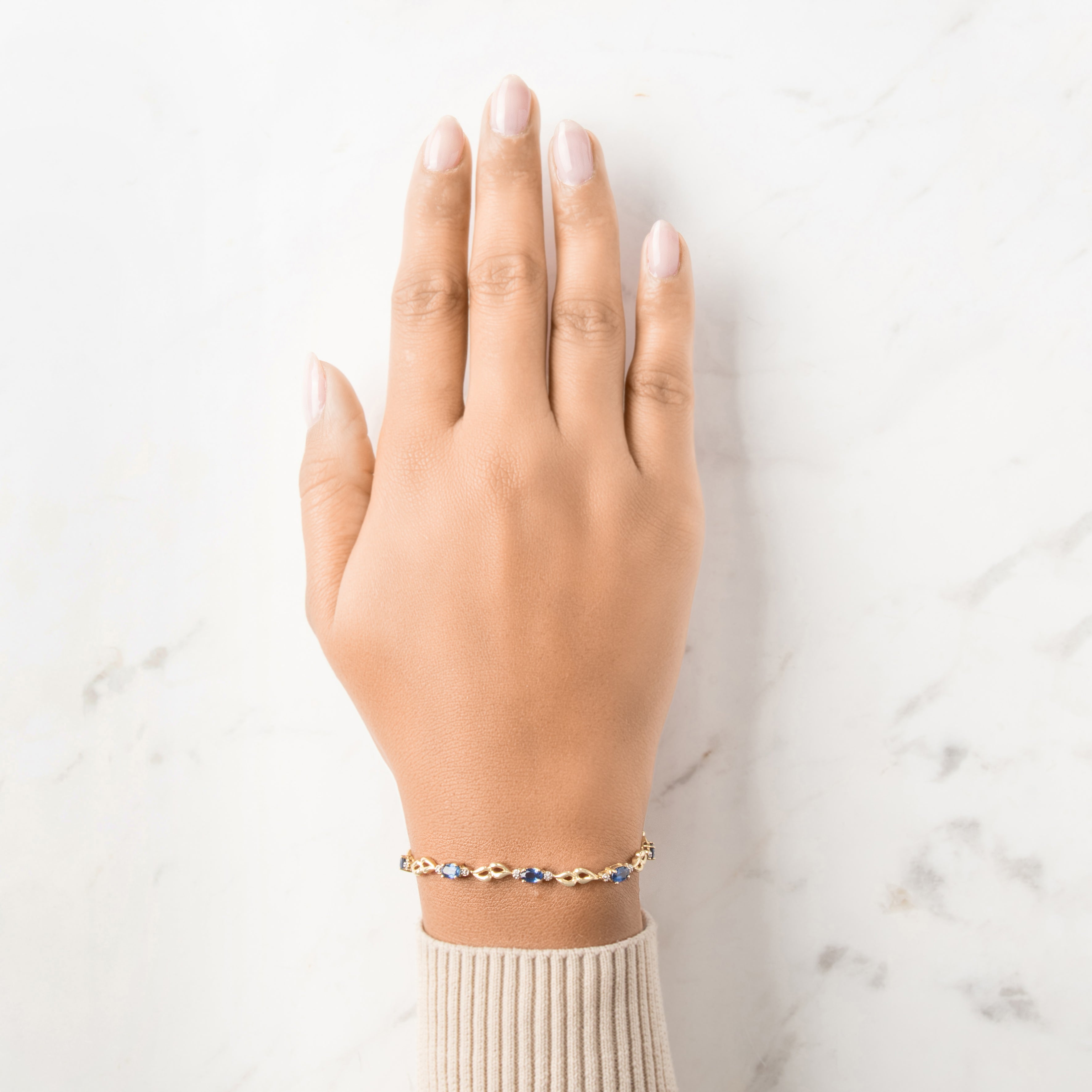 Vintage 14k Yellow Gold 2.28cttw Blue Sapphire Diamond Looping Trio Link Bracelet - On model view