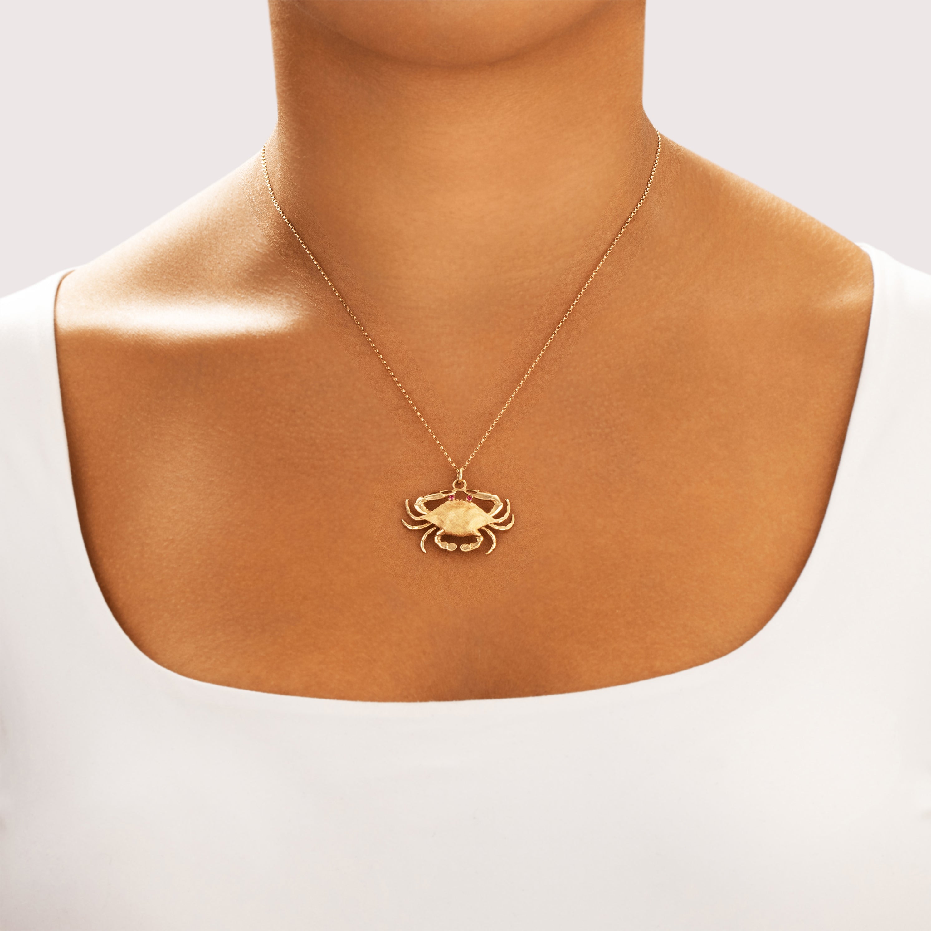 Vintage 14k Yellow Gold Synthetic Ruby Textured Nautical Grasping Crab Pendant - On model view