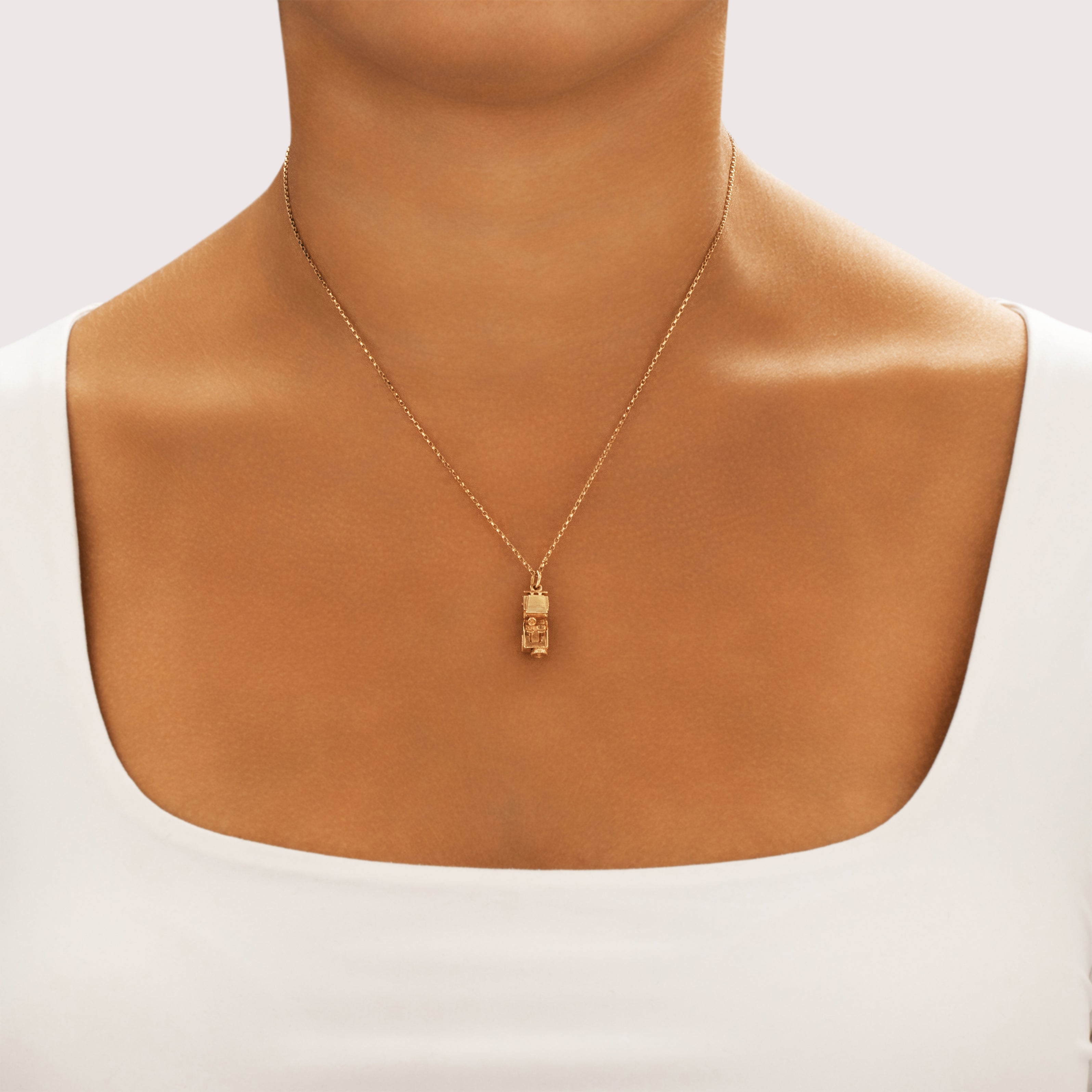 Vintage 14k Yellow Gold Articulating Military Jeep Charm / Pendant - On model view