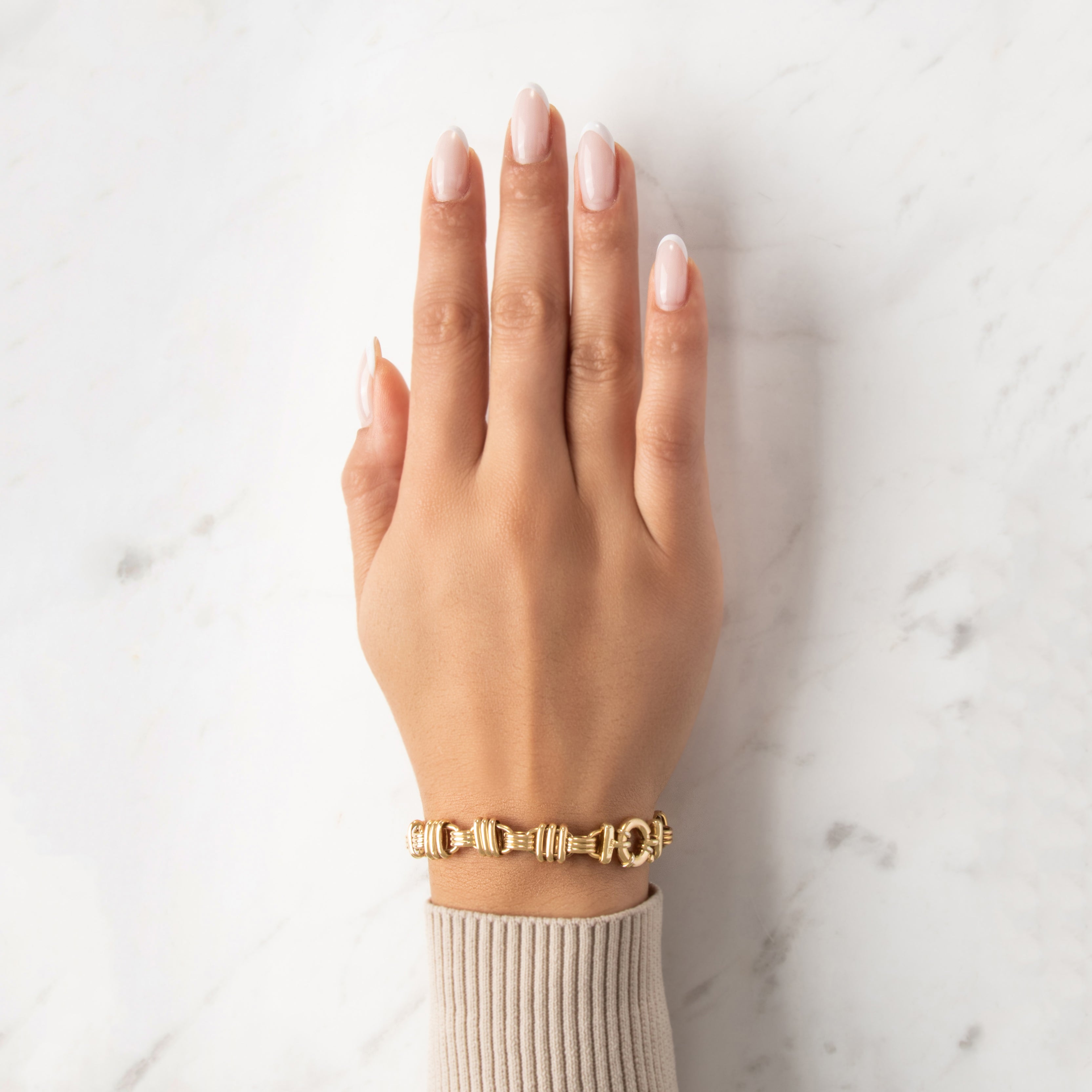 Vintage Italian 14k Yellow Gold Bold Ribbed Oval Link Bracelet - On model view