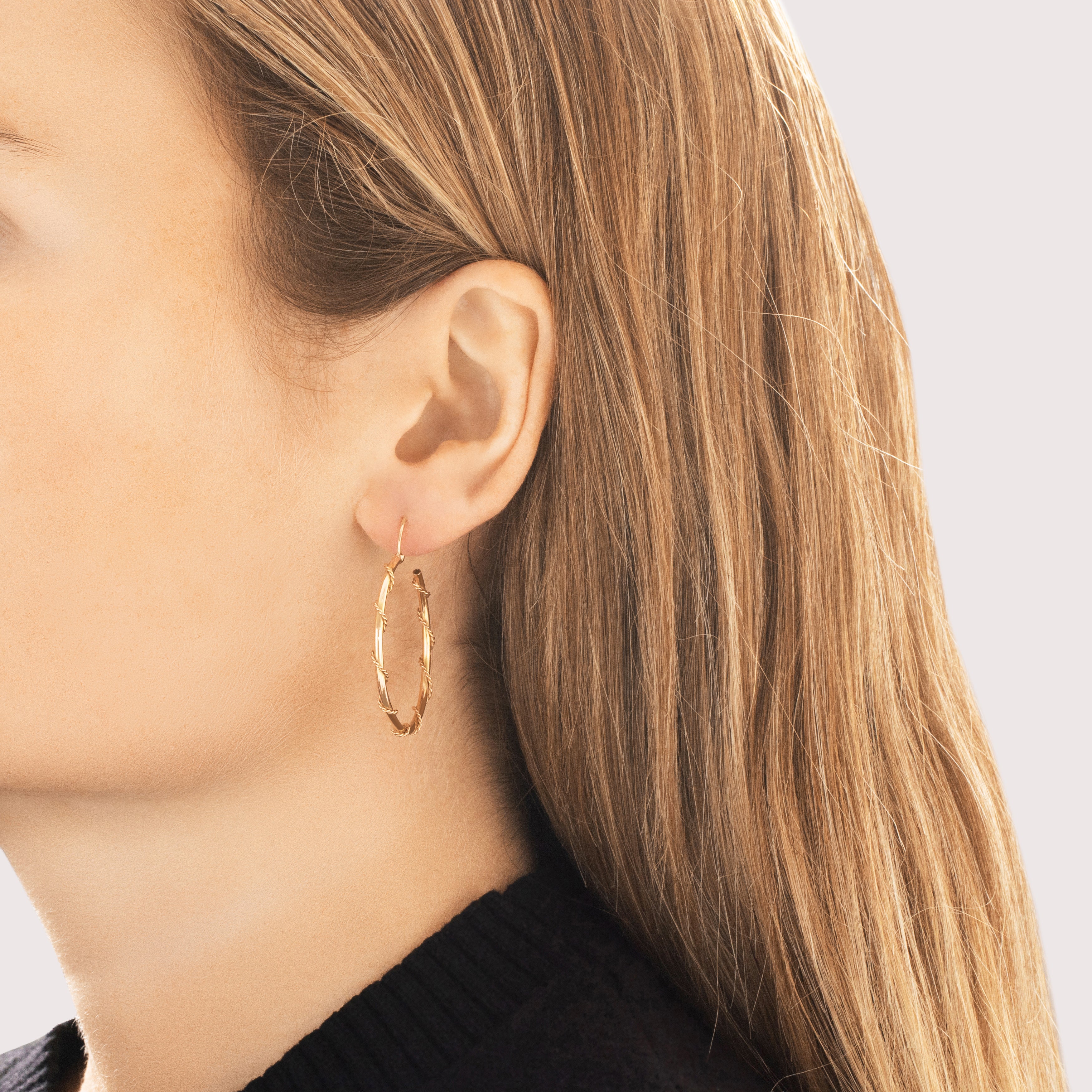 Vintage 14k Yellow & Rosy Yellow Gold Sleek Twisted Wrap Rope Hoop Earrings - On model view