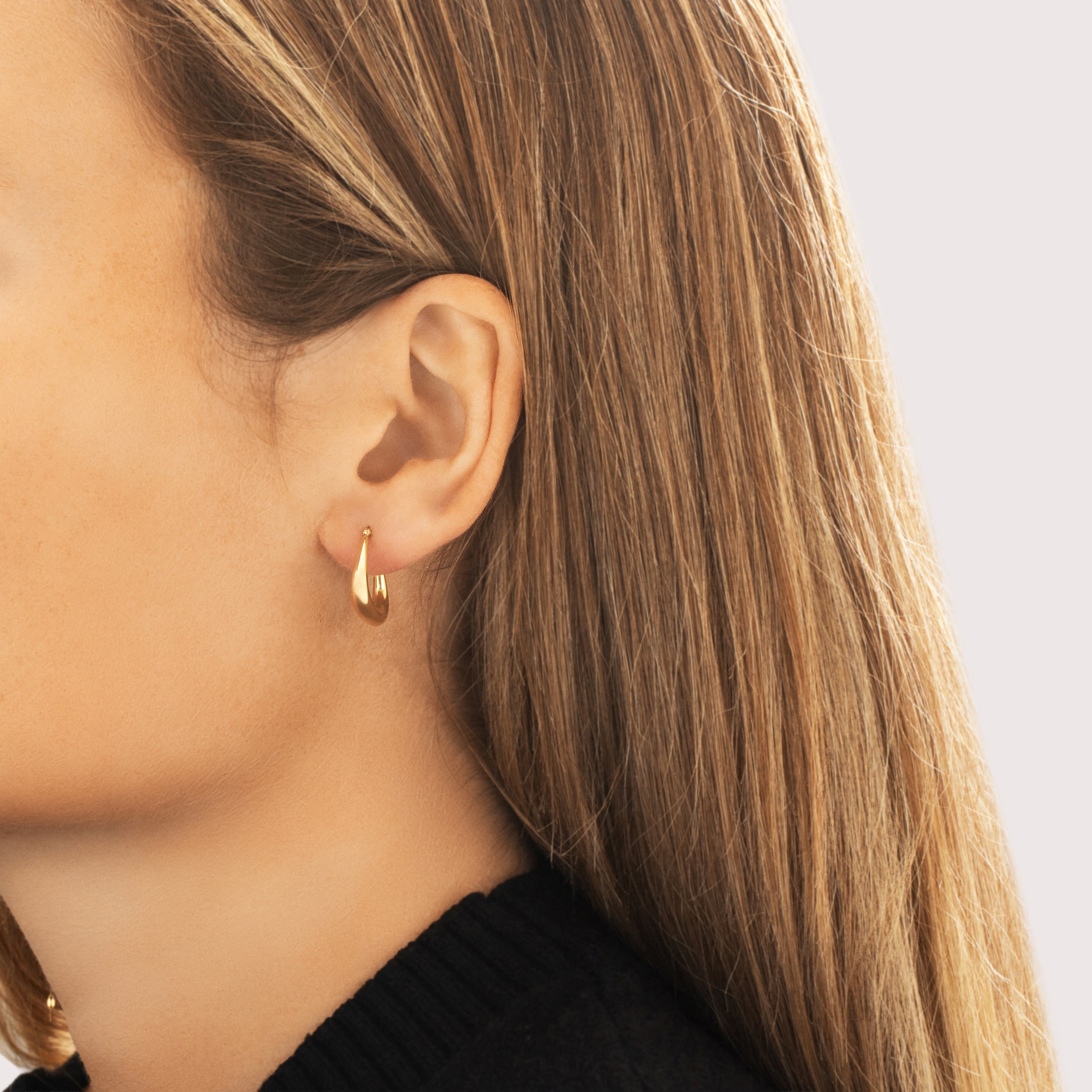 Vintage 14k Yellow Gold Gleaming Tubular Hoop Earrings - On model view