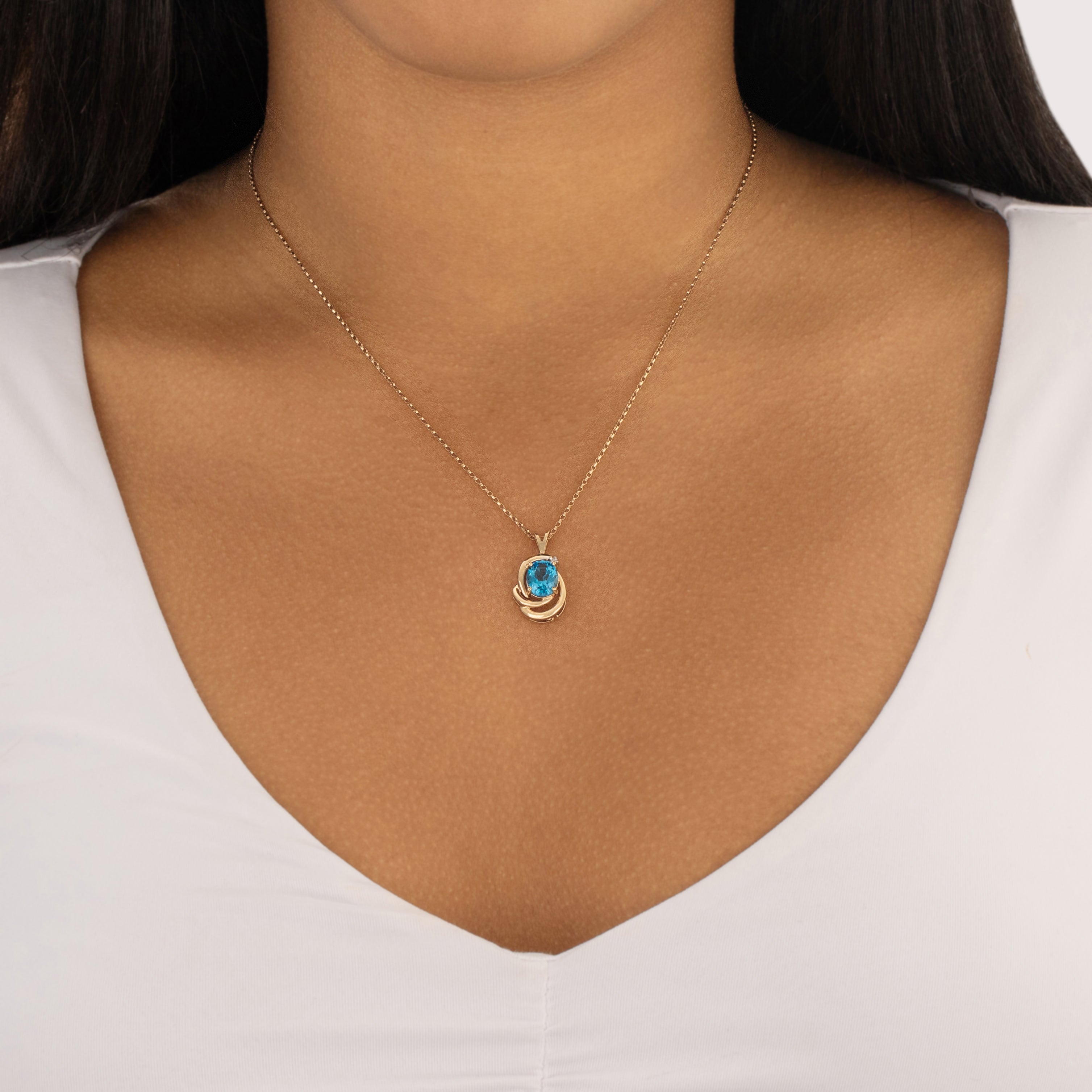 Vintage 14k Yellow Gold 2.21ct Blue Topaz Diamond Swirling Accented Oval Pool Pendant - On model view
