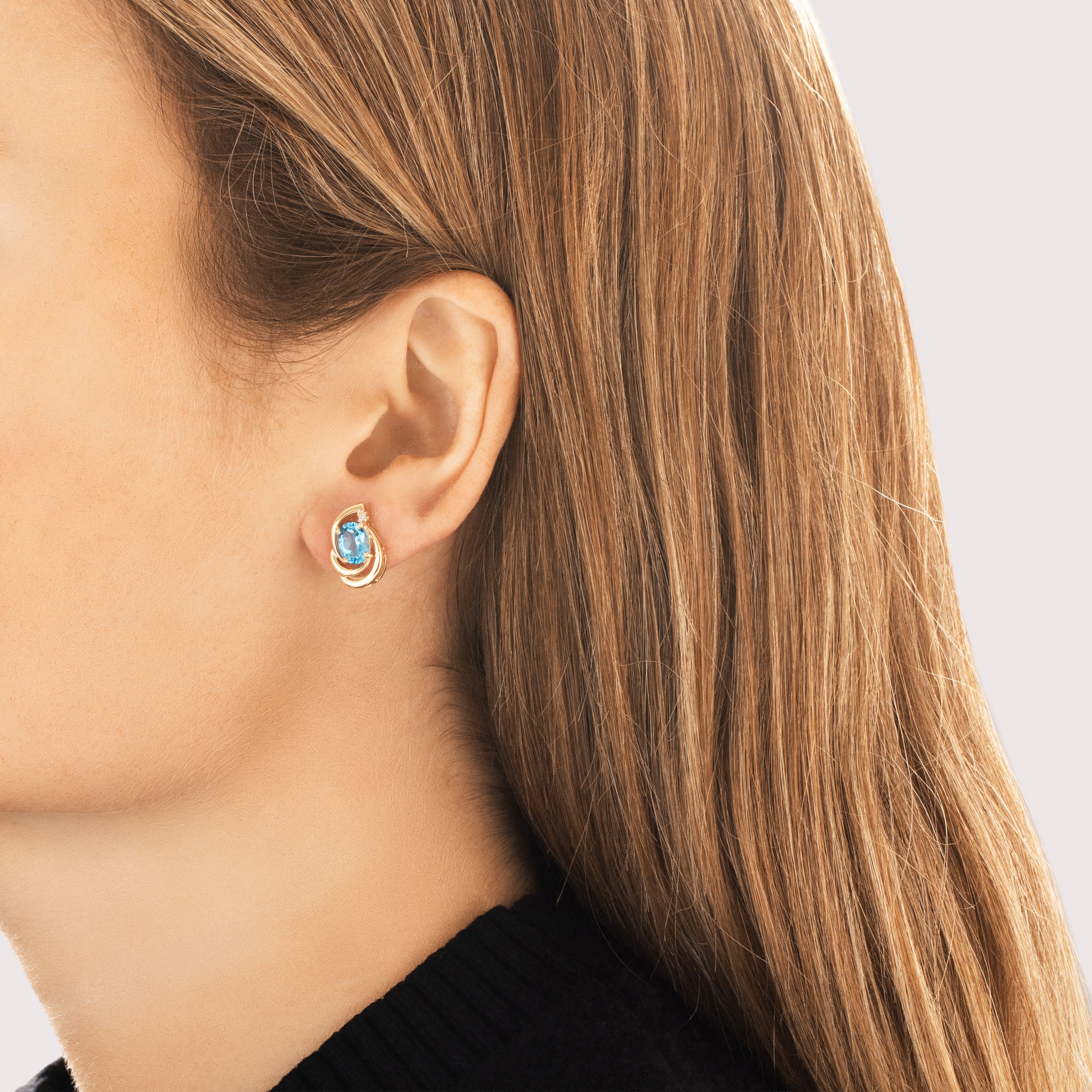 Vintage 14k Yellow Gold 2.82cttw Blue Topaz Diamond Swooping Accented Oval Stud Earrings - On model view