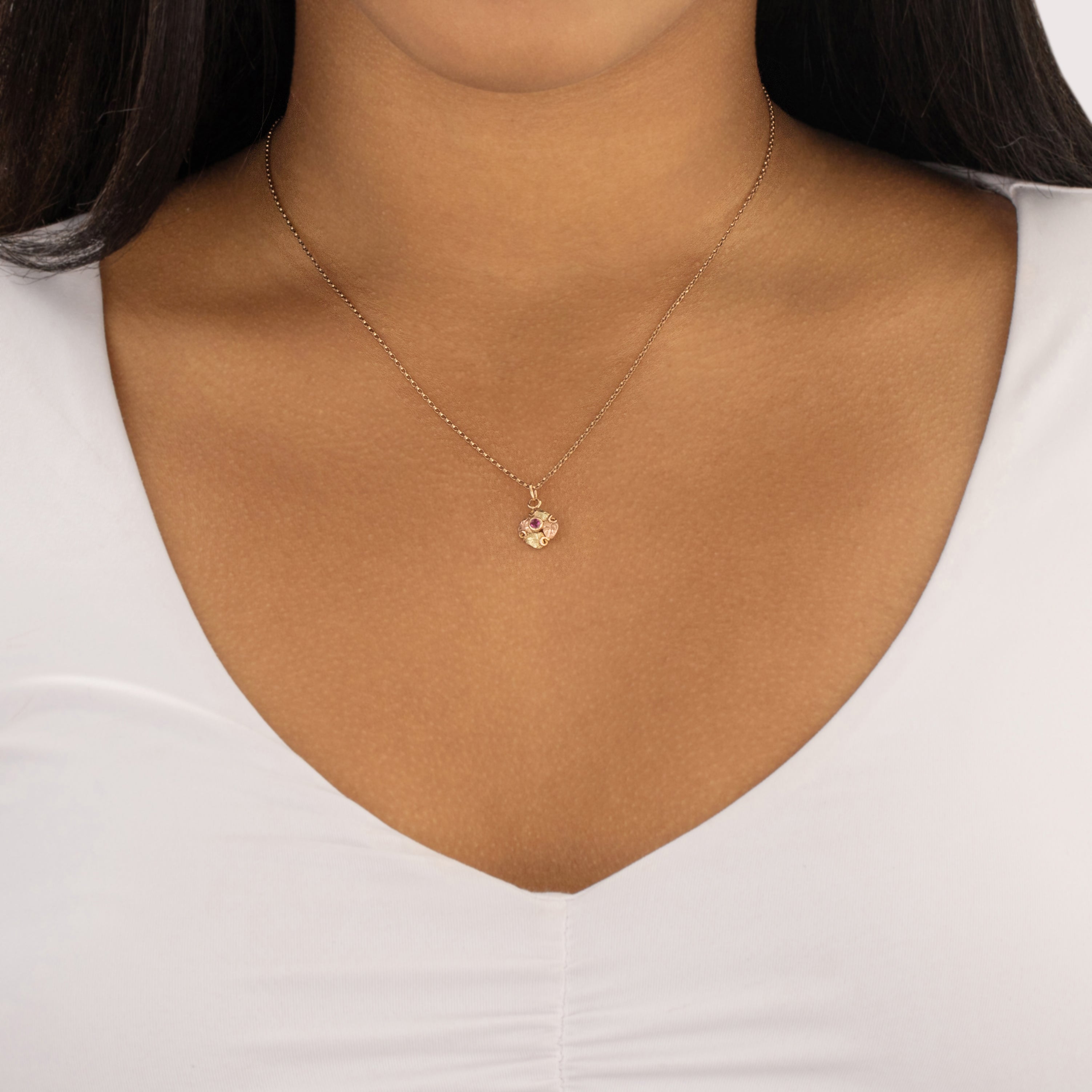 Antique 14k Yellow & Rose Gold Synthetic Ruby Leafy Framed Solitaire Charm / Pendant - On model view