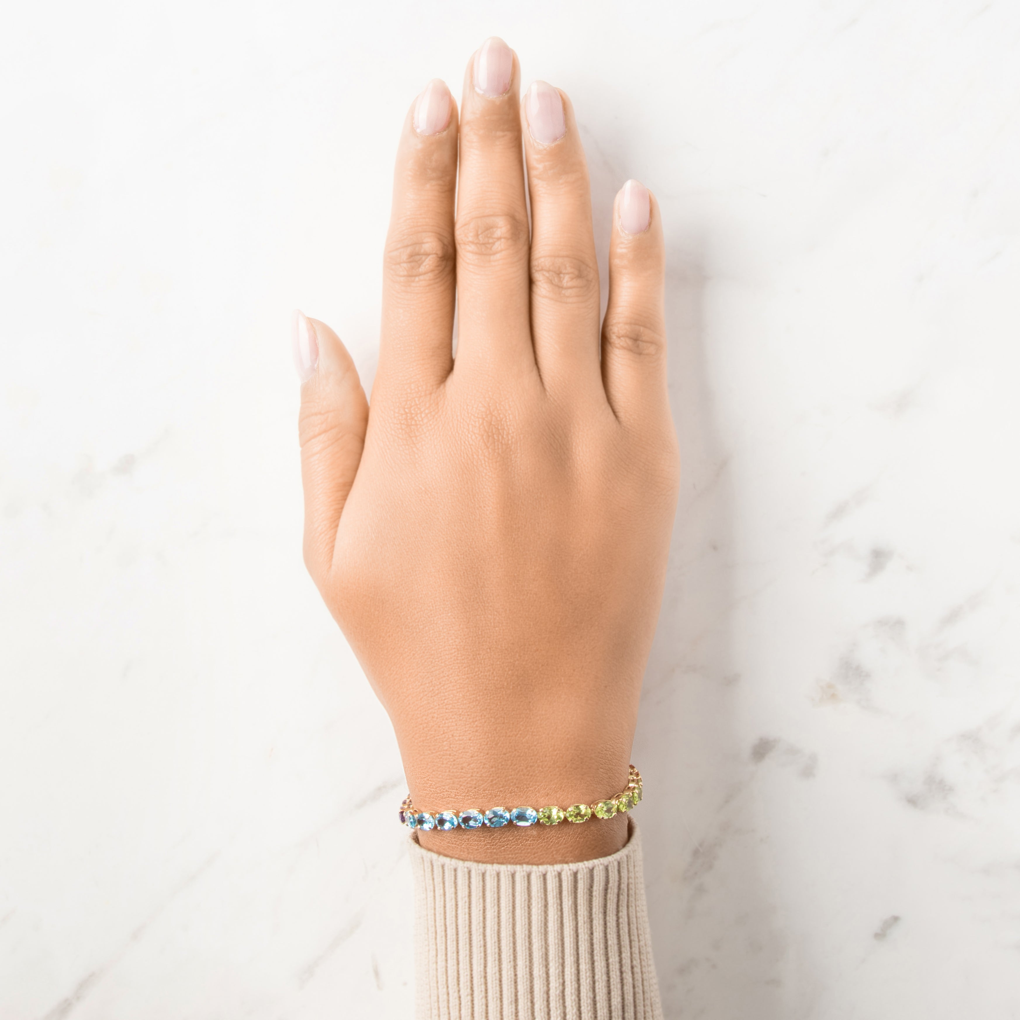 Vintage 14k Yellow Gold 3.34cttw Garnet 2.73cttw Green Peridot 2.66cttw Blue Topaz 2.03cttw Citrine 1.94cttw Amethyst Fantastic Rainbow Oval Line Bracelet - On model view