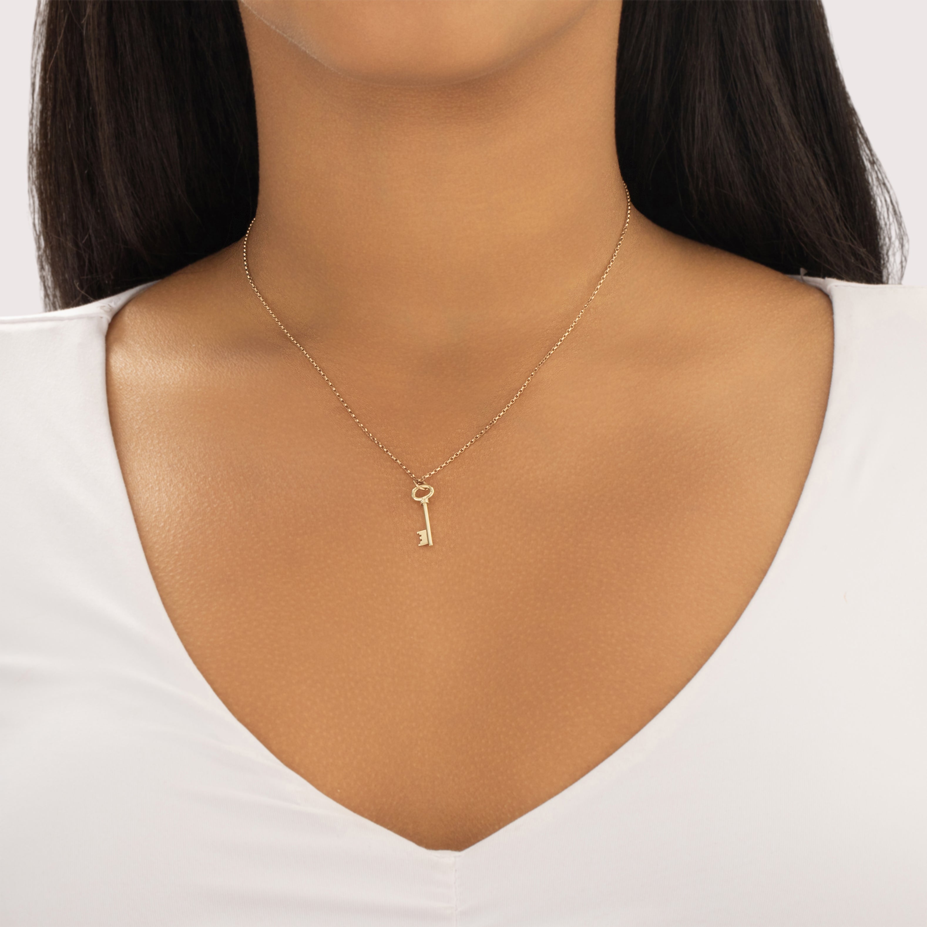 Vintage 14k Yellow Gold Delicate Skeleton Key Charm / Pendant - On model view