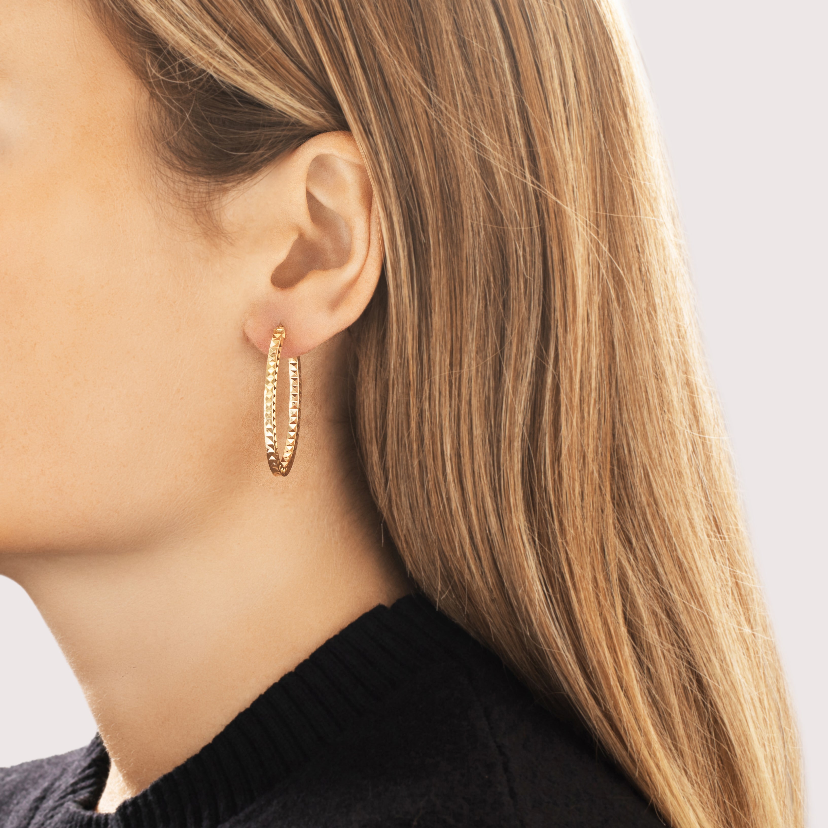 Vintage Italian 14k Yellow Gold Oval Diamond Cut Pyramid Hoop Earrings - On model view
