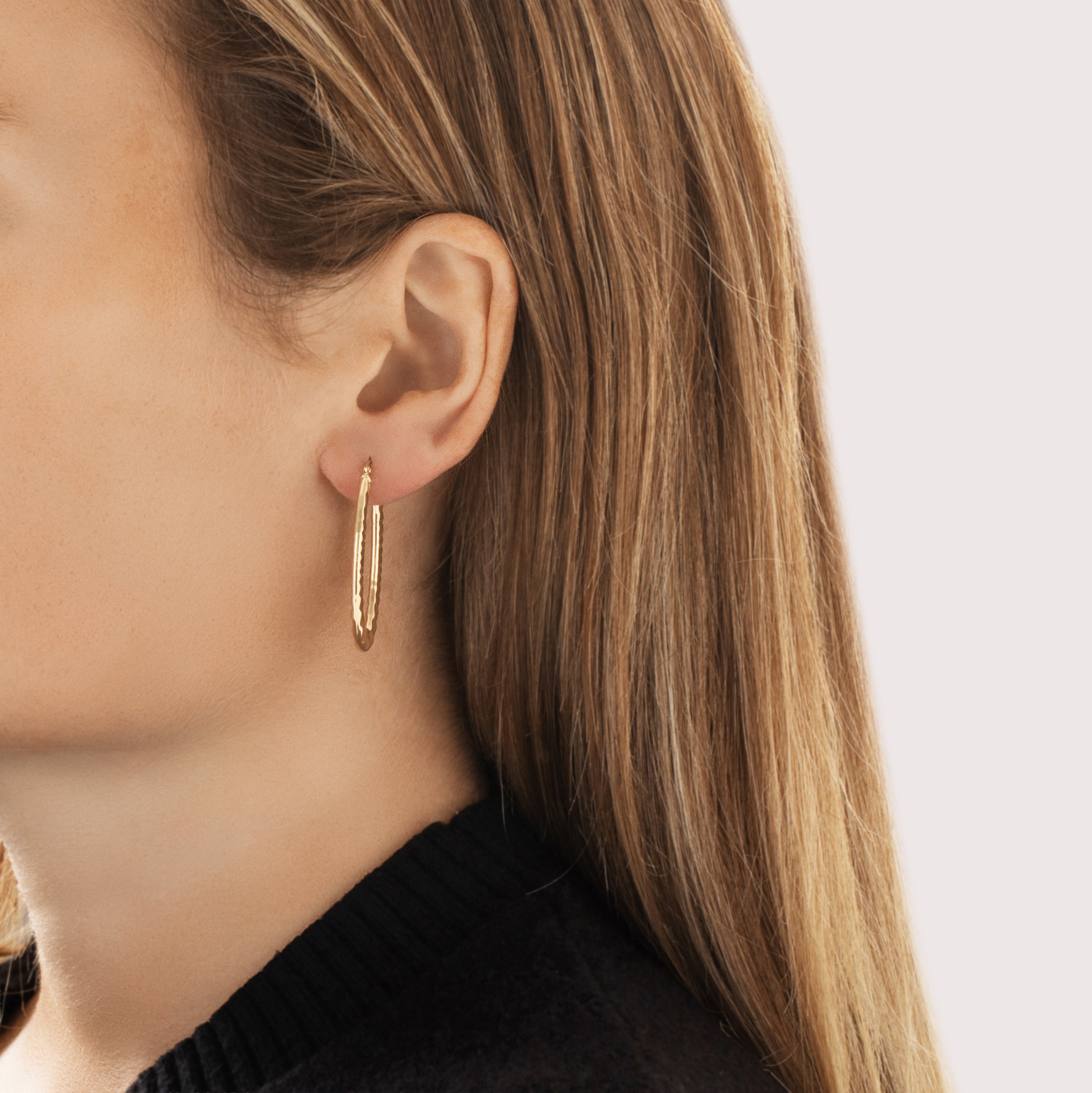 Vintage Italian 14k Yellow Gold Shiny Ridged Elongated Hoop Earrings - On model view
