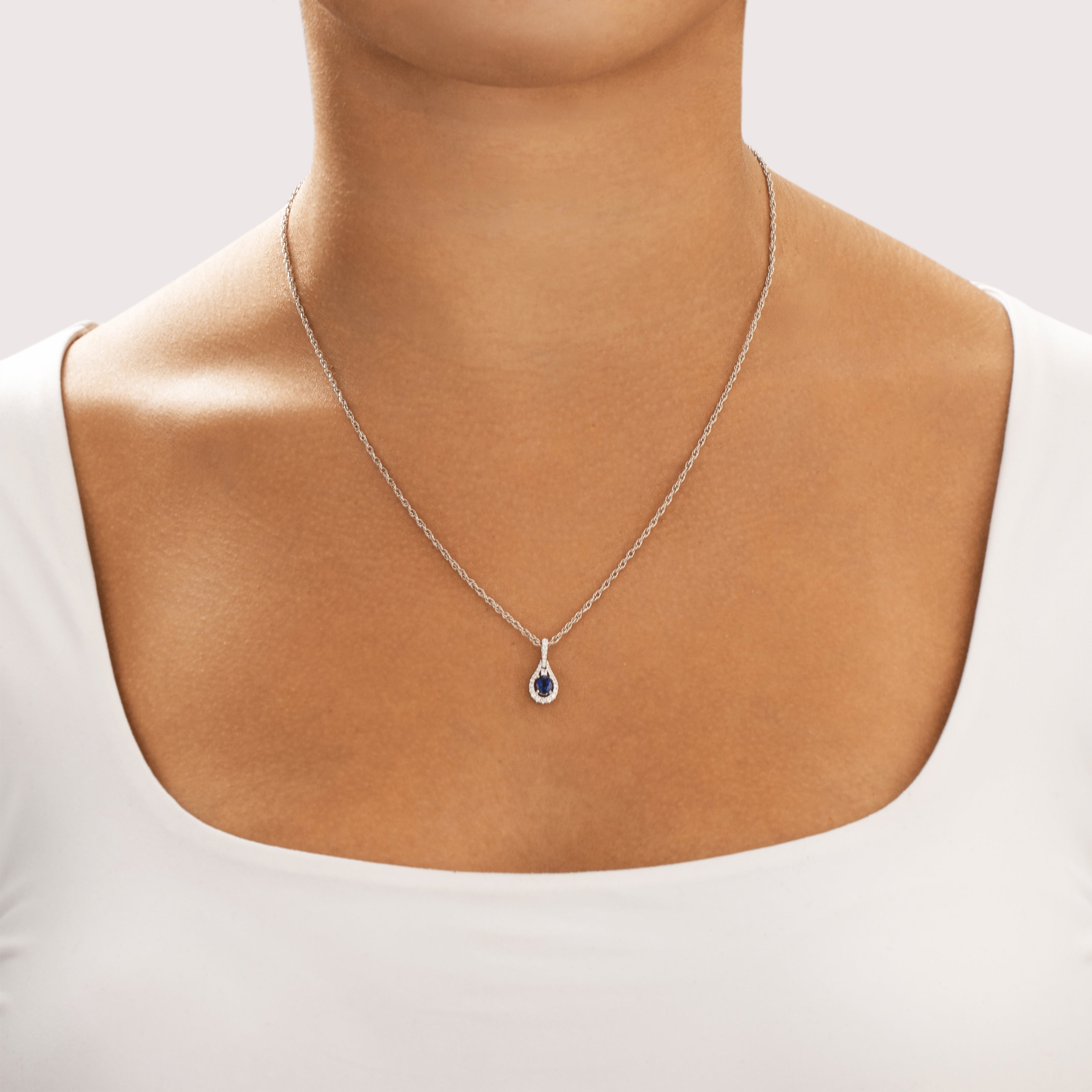 Vintage Small 14k White Gold Blue Sapphire Diamond Elegant Oval Dangle Pendant - On model view