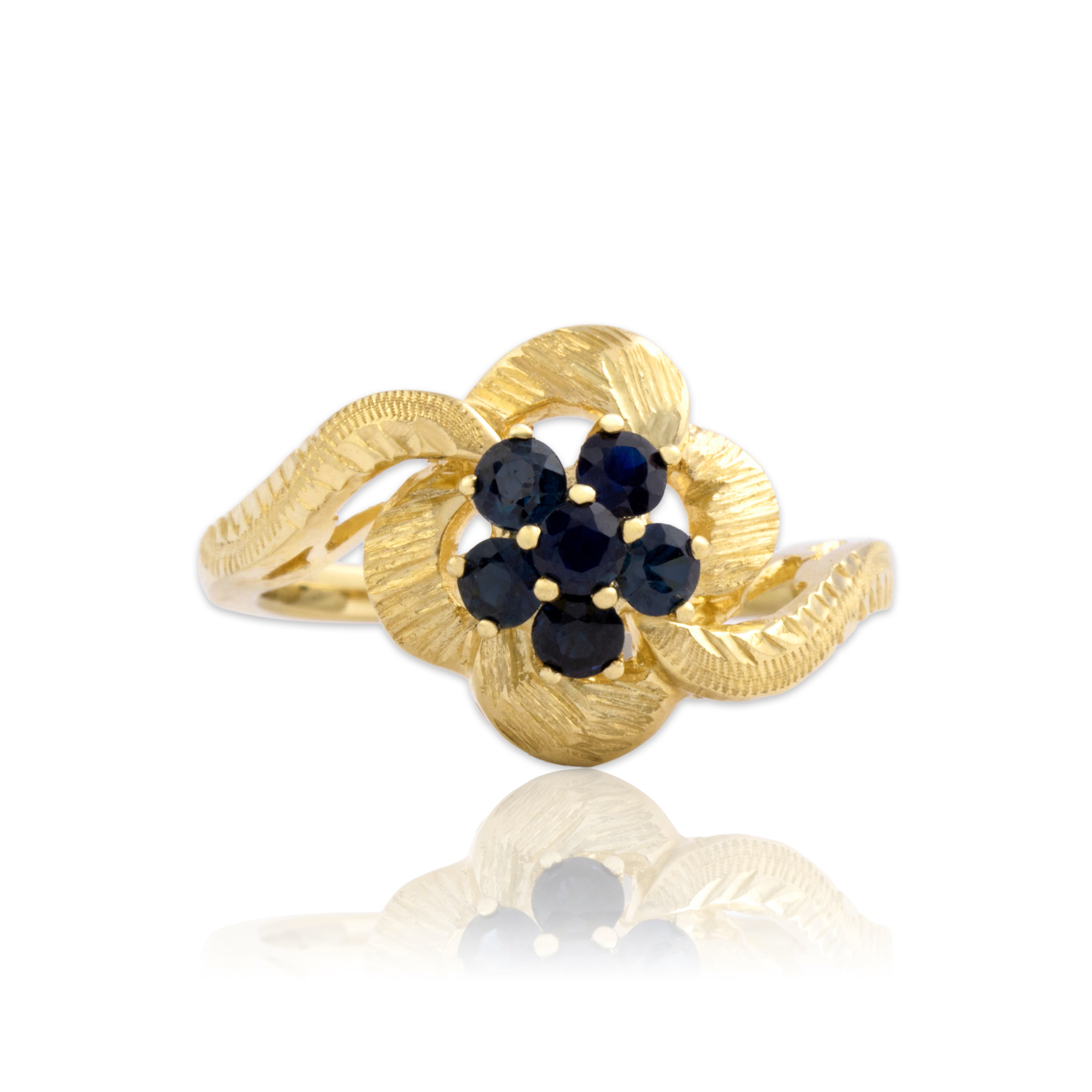 Vintage 14k Yellow Gold Blue Sapphire Feminine Textured Flower Bypass Ring - Close-up view