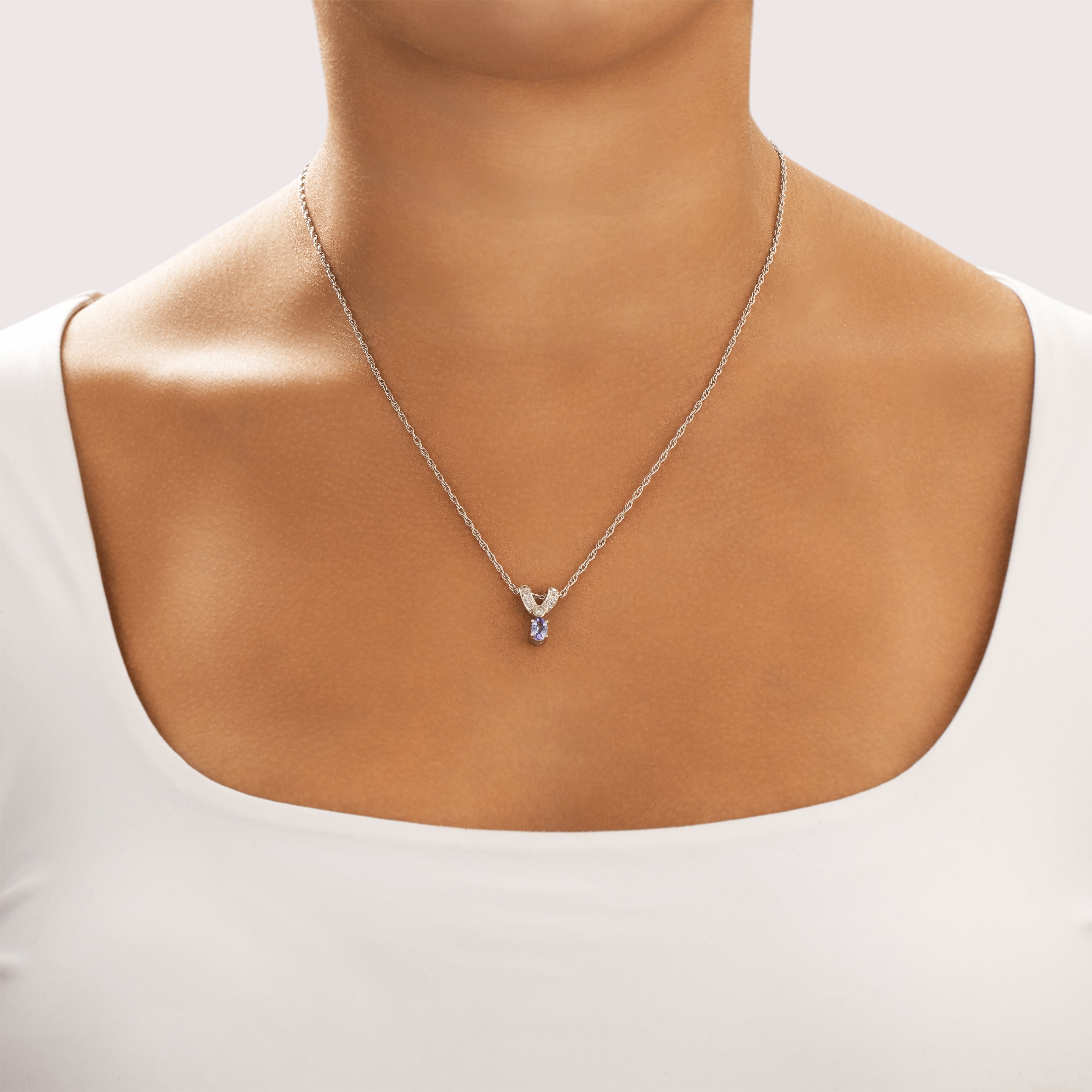 Vintage 14k White Gold Tanzanite Diamond Sparkling Chevron Bail Drop Pendant - On model view