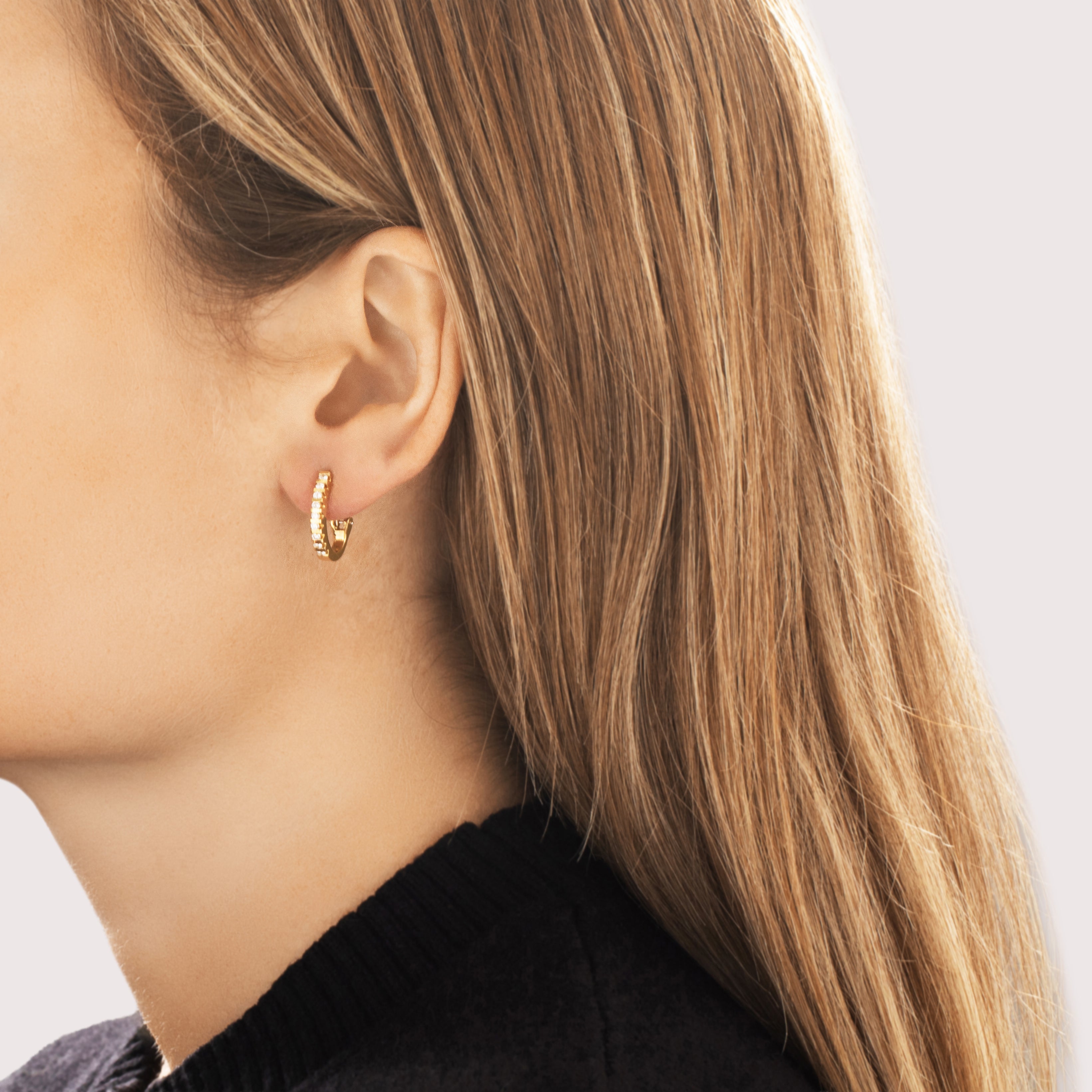 Vintage 18k Yellow Gold Diamond Chic Sparkling Channel Line Omega-Back Hoop Earrings - On model view