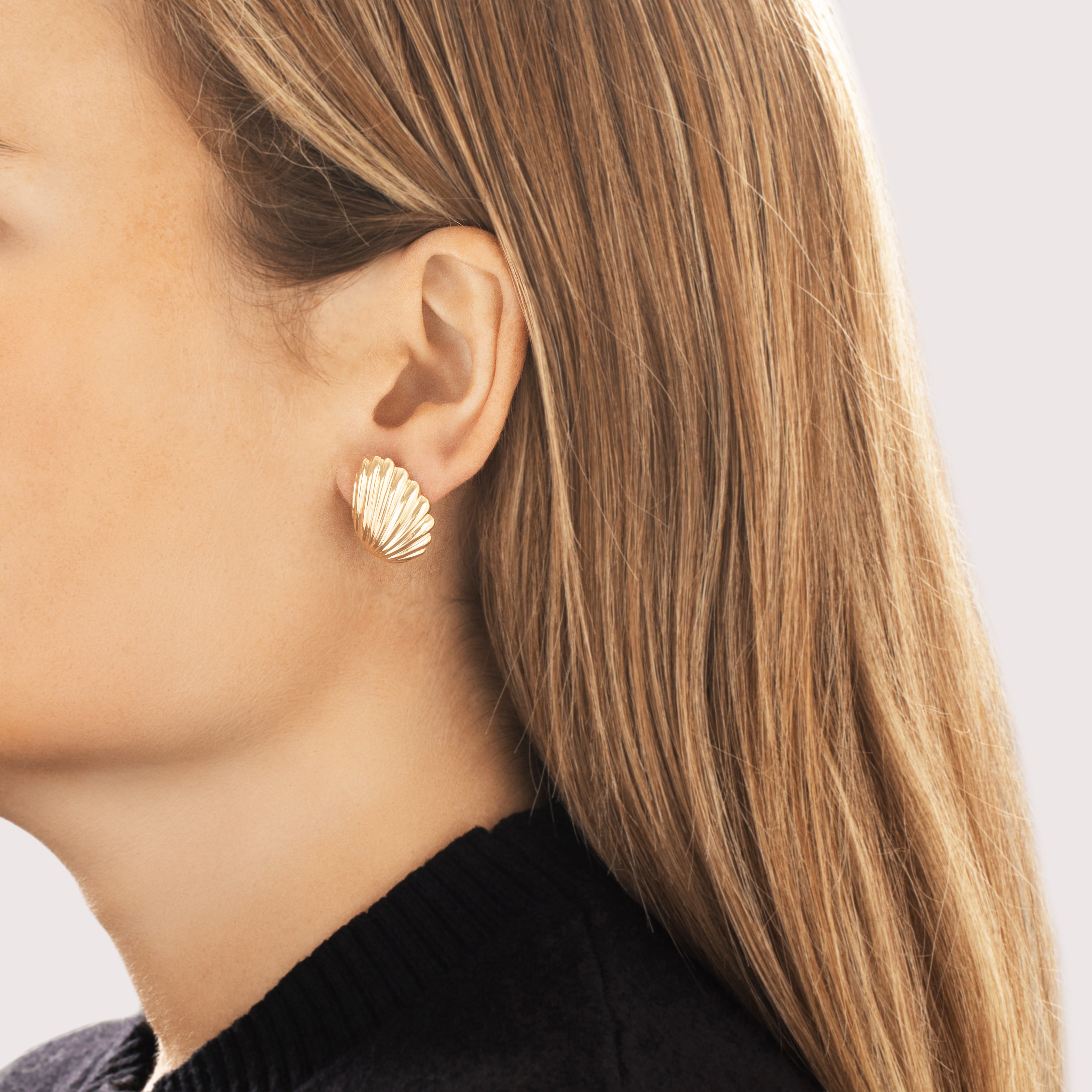 Vintage 14k Yellow Gold Bold Scalloped Sea Shell Omega Back Earrings - On model view