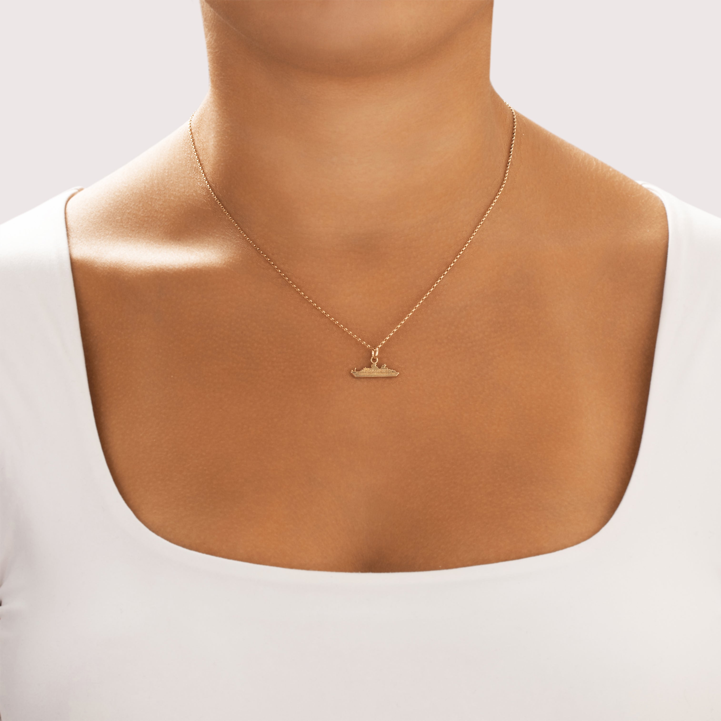 Vintage Small 14k Yellow Gold Intricate Ocean Liner Charm / Pendant - On model view