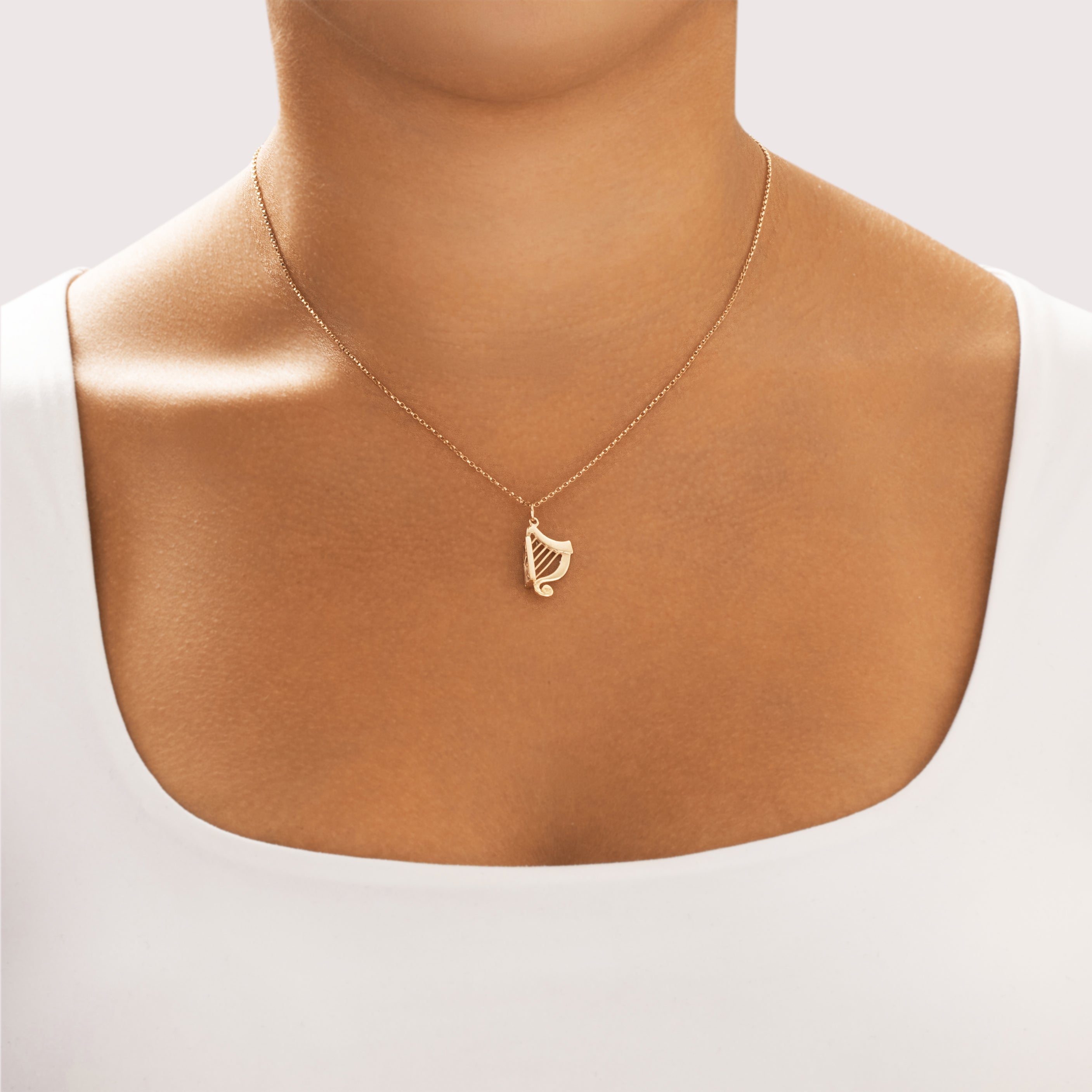 Vintage Irish 10k Yellow Gold Celtic Trinity Knot Harp Charm / Pendant - On model view
