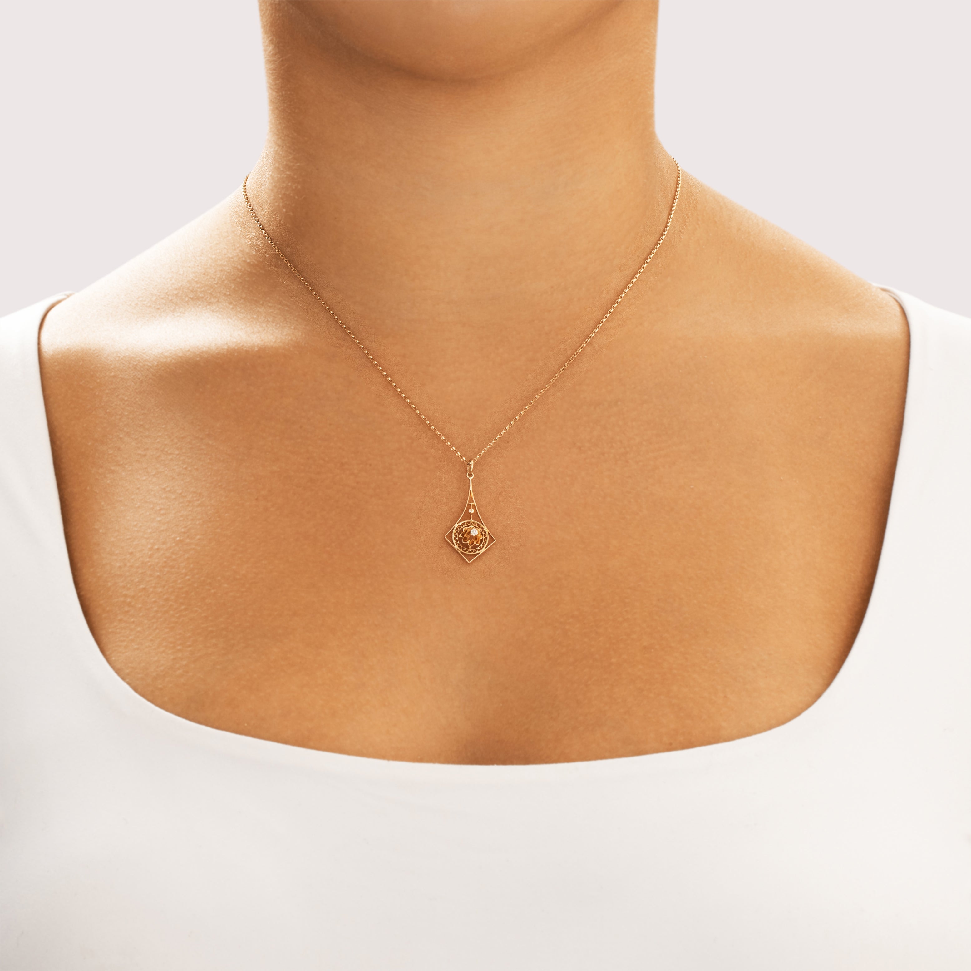Antique Edwardian 10k Yellow Gold Old Mine Cut Diamond Intricate Openwork Buttercup-Set Kite Pendant - On model view