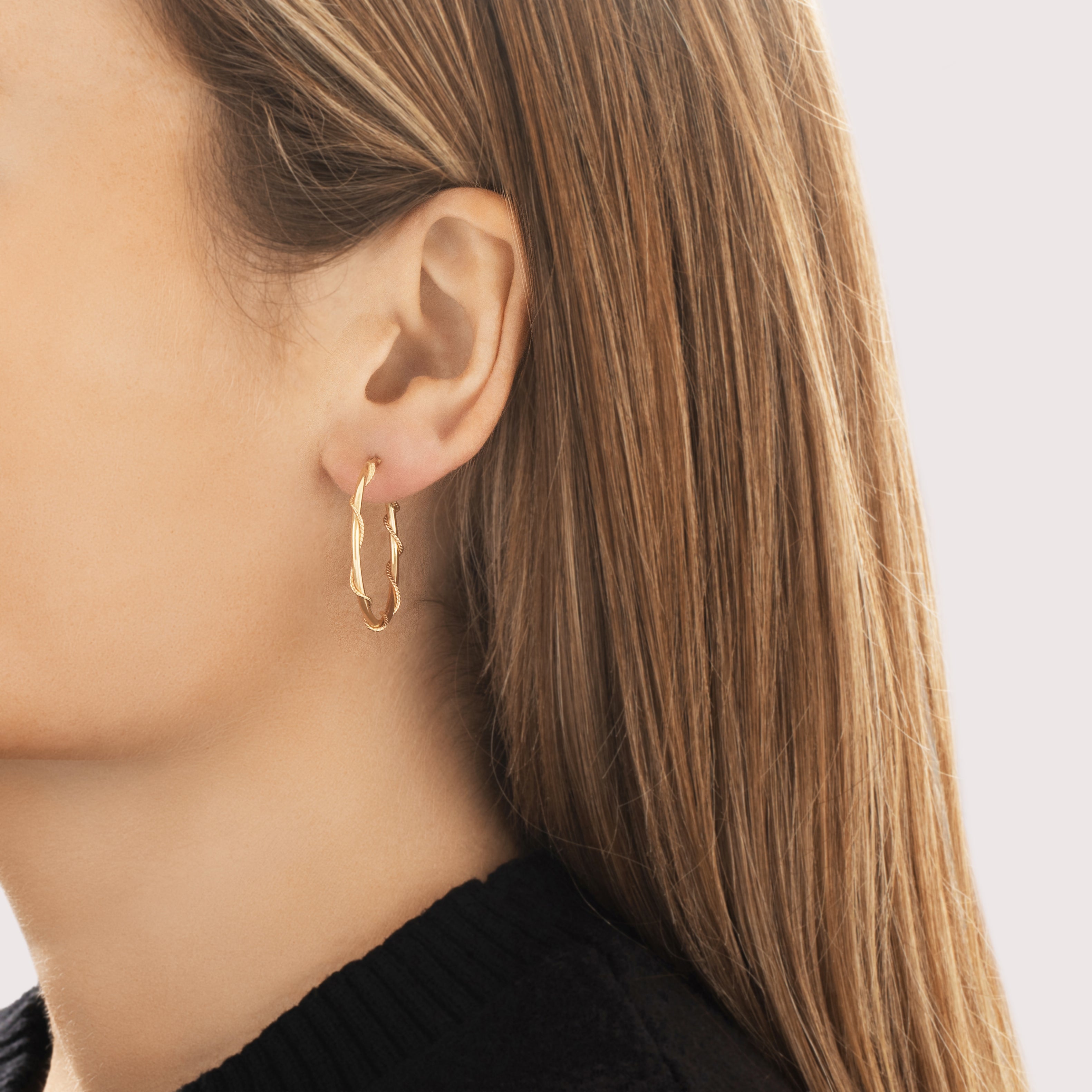 Vintage Italian 18k Yellow Gold Sleek Intertwined Rope Hoop Earrings - On model view