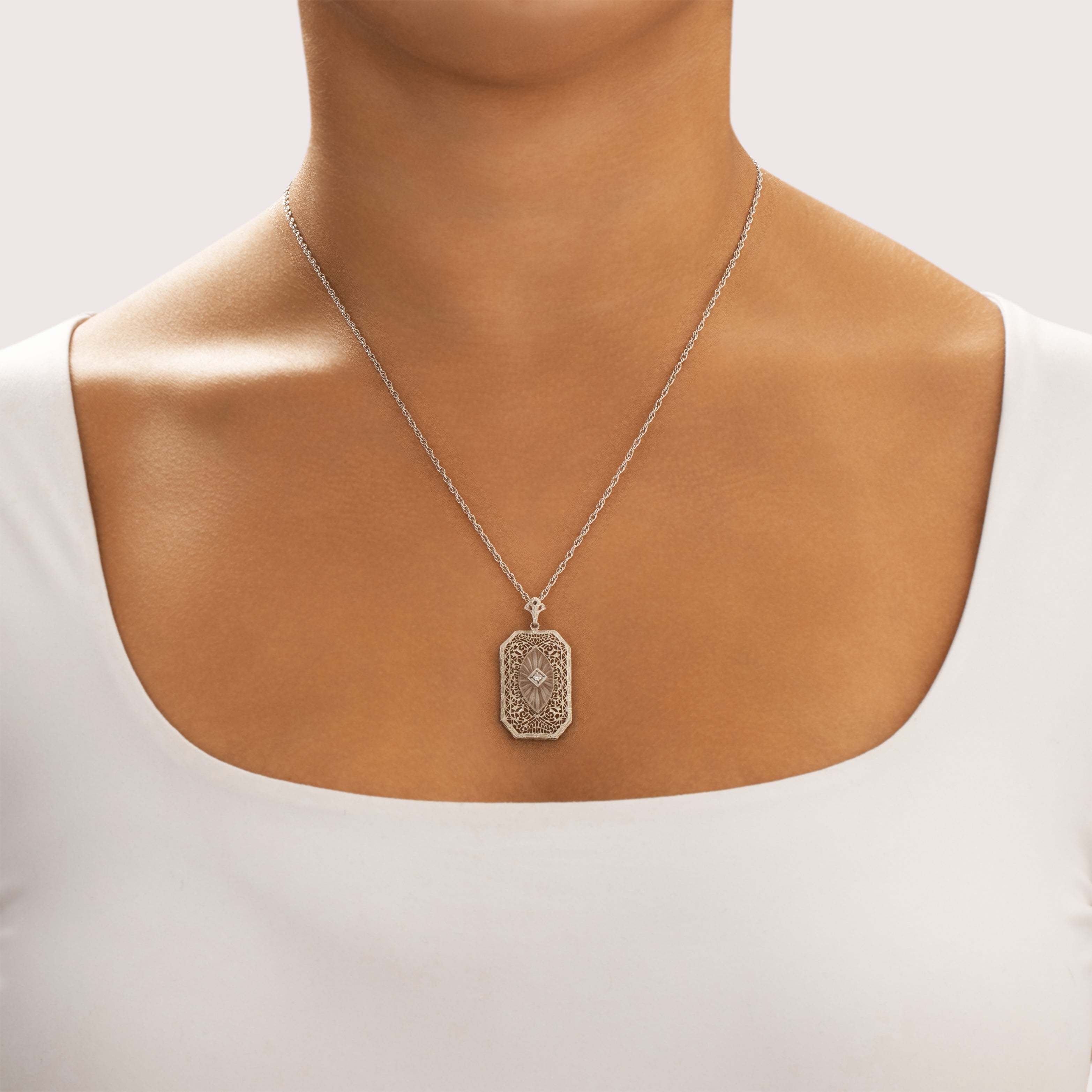 Antique Art Deco 10k White Gold Camphor Glass Diamond Delicate Filigree Pendant - On model view