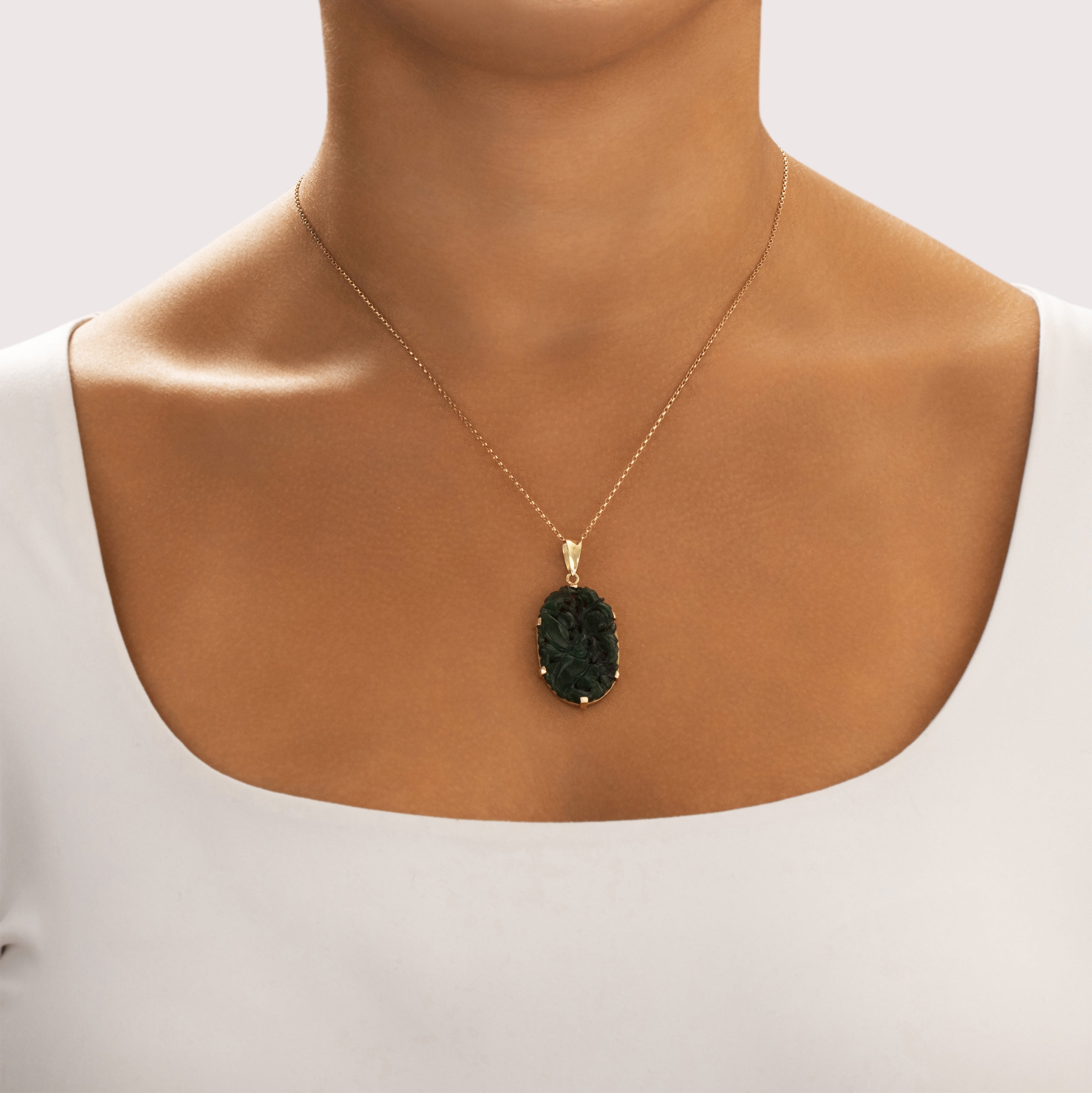 Vintage 14k Yellow Gold Dark Green Jade Intricate Floral Carving Pendant - On model view