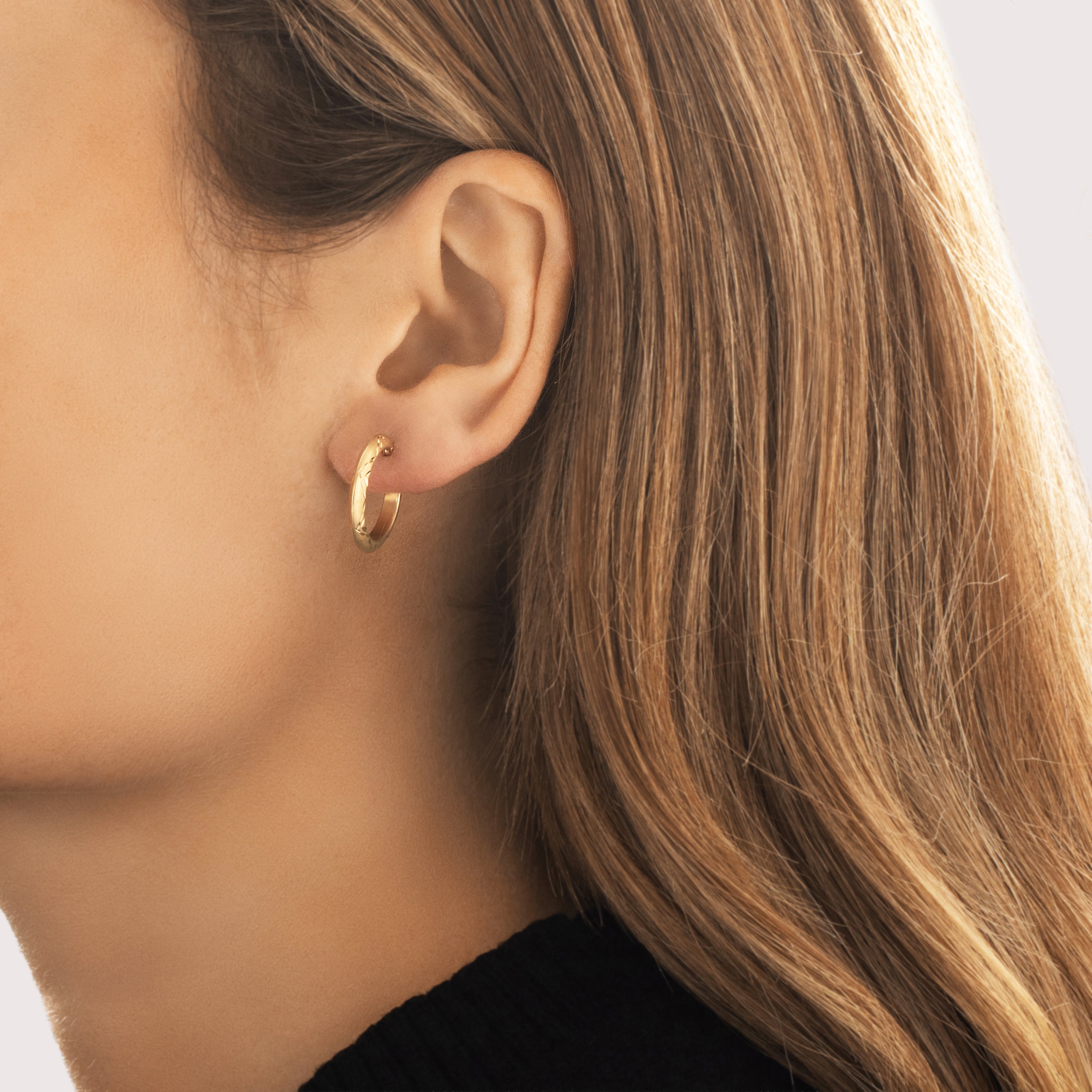 Vintage Small 14k Yellow Gold Dual Finish Diamond Cut Hoop Earrings - On model view