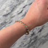 Vintage 14k Yellow Gold 2.0cttw Blue Topaz 1.65cttw Pink Garnet 1.41cttw Amethyst 1.33cttw Peridot 1.25cttw Citrine Iolite Chic Partial Bezel Rainbow Bracelet - Video showing the piece