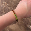 Vintage 18k Yellow Gold 4.71cttw Pink Red Garnet 4.53cttw Blue Topaz 4.17cttw Peridot 3.73cttw Amethyst 3.29cttw Citrine 1.94cttw Iolite Stunning Rainbow Line Bracelet - Video showing the piece