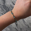 Vintage 14k Yellow Gold 9cttw Blue Topaz Crossing Link Line Bracelet - Video showing the piece