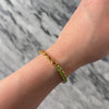 Vintage 14k Yellow Gold 3.01cttw Red Garnet 2.75cttw Peridot 2.68cttw Blue Topaz 2.34cttw Citrine 1.91cttw Amethyst Rainbow Playful Tennis Link Bracelet - Video showing the piece