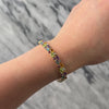 Vintage 14k Yellow Gold 2.97cttw Light Blue Topaz 2.38cttw Amethyst 2.23cttw Green Peridot 2.12cttw Citrine .6cttw Pink Garnet Blue Purple Iolite Vibrant Multi-Cut Link Bracelet - Video showing the piece