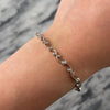 Vintage 14k White Gold Diamond Playful Swirling Bezel-Set Link Line Bracelet - Video showing the piece